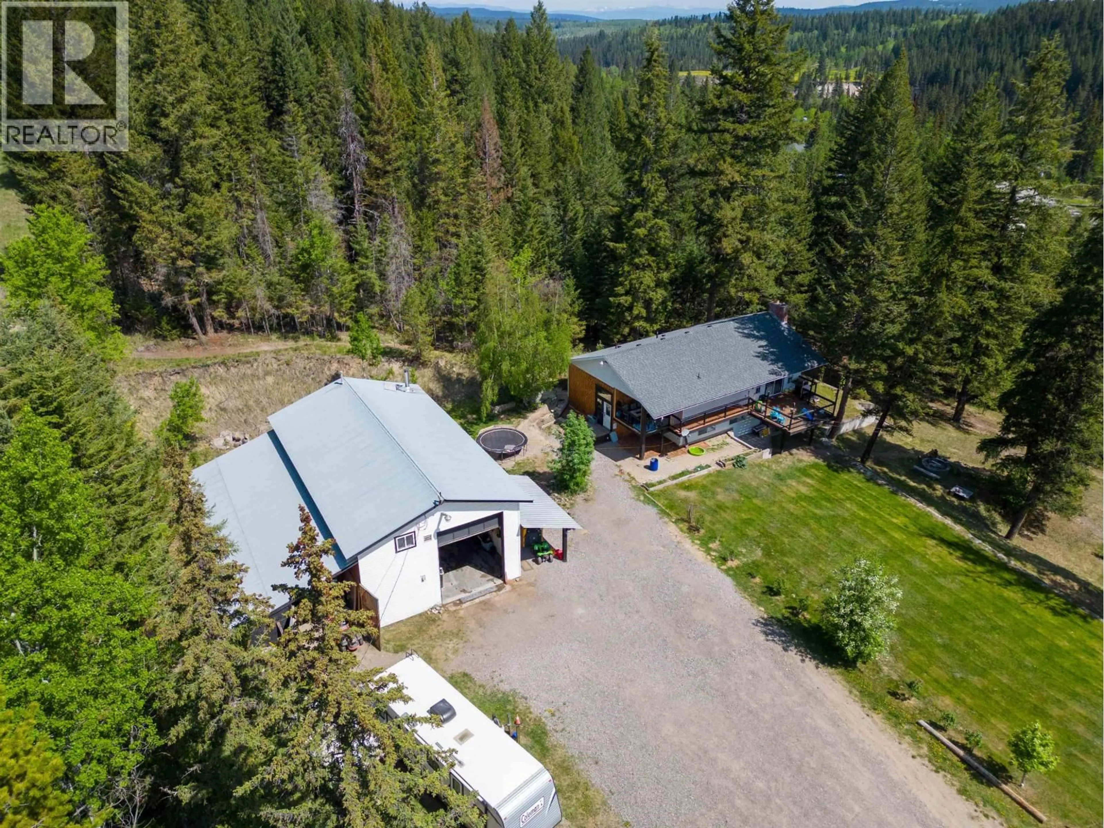 A pic from outside/outdoor area/front of a property/back of a property/a pic from drone, unknown for 5612 CANIM-HENDRIX LAKE ROAD, 100 Mile House British Columbia V0K1M0