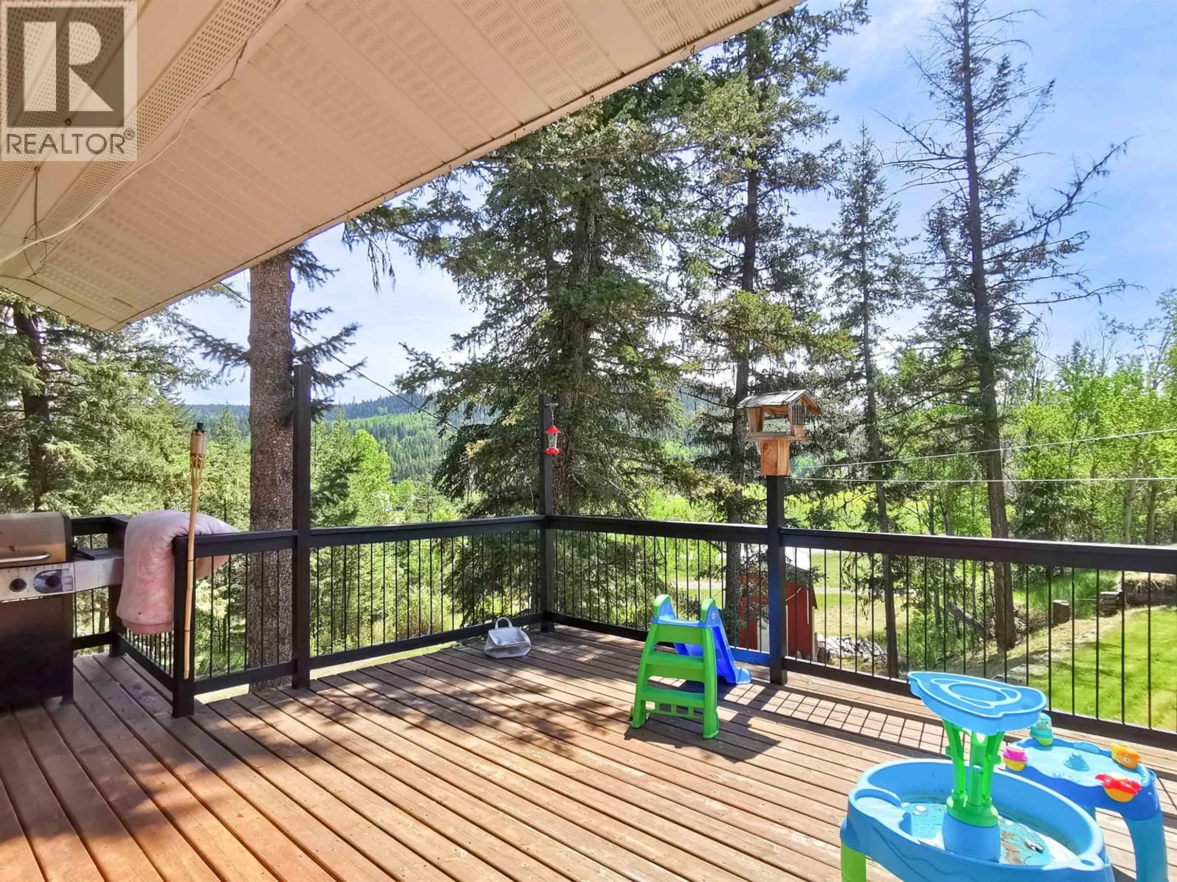 Patio, forest/trees view for 5612 CANIM-HENDRIX LAKE ROAD, 100 Mile House British Columbia V0K1M0