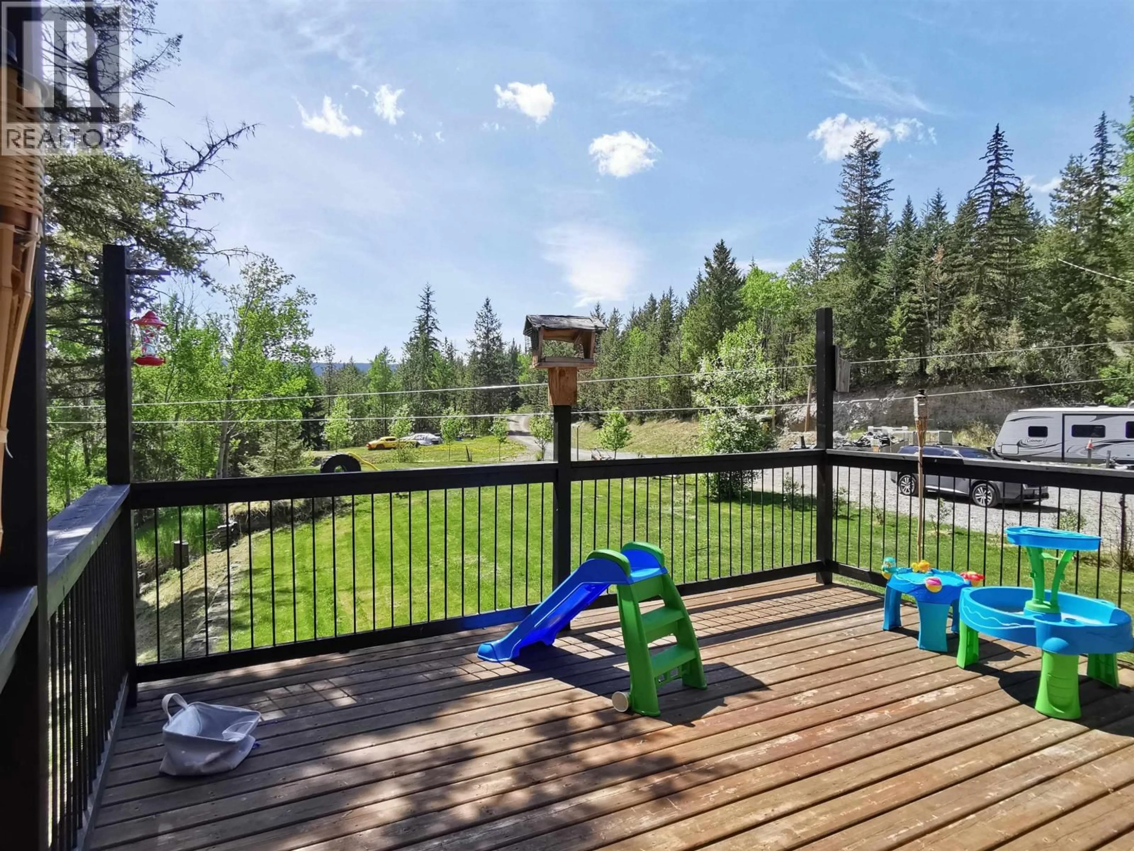 Patio, forest/trees view for 5612 CANIM-HENDRIX LAKE ROAD, 100 Mile House British Columbia V0K1M0