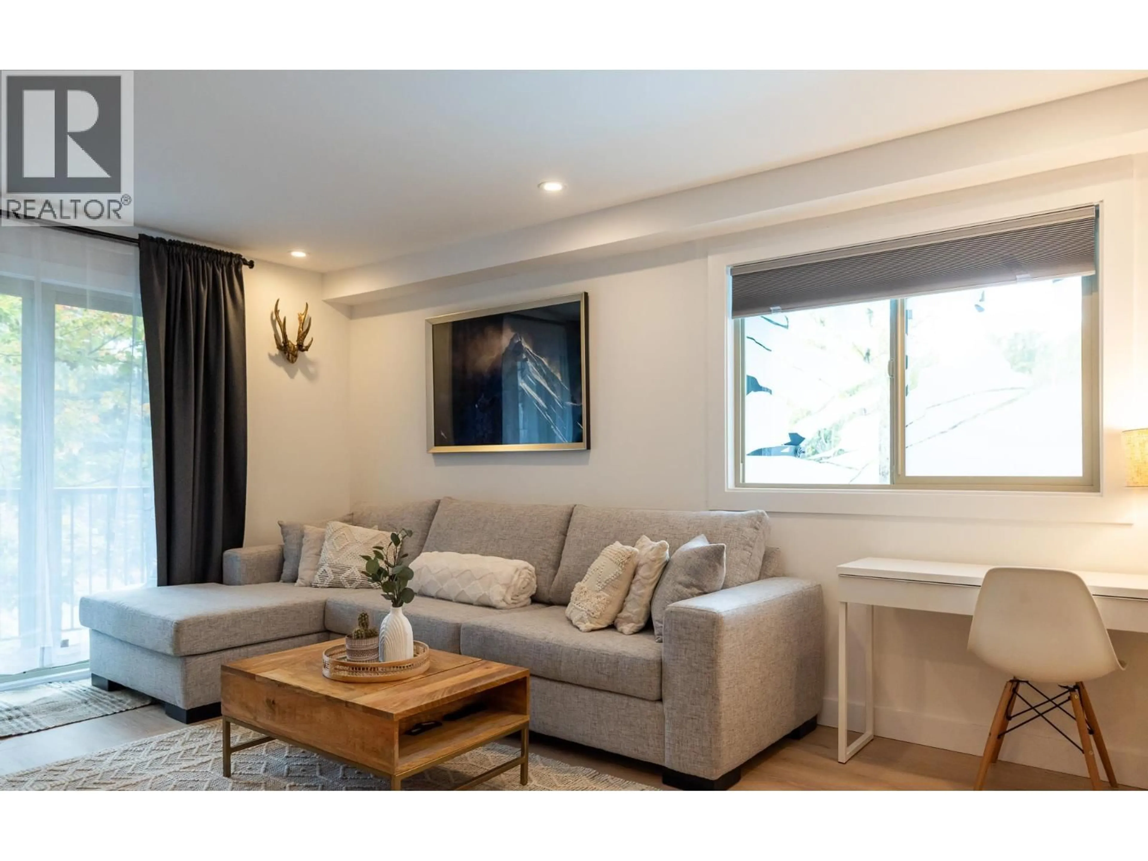 Living room with furniture, wood/laminate floor for 100 - 2021 KAREN CRESCENT, Whistler British Columbia V8E0H1