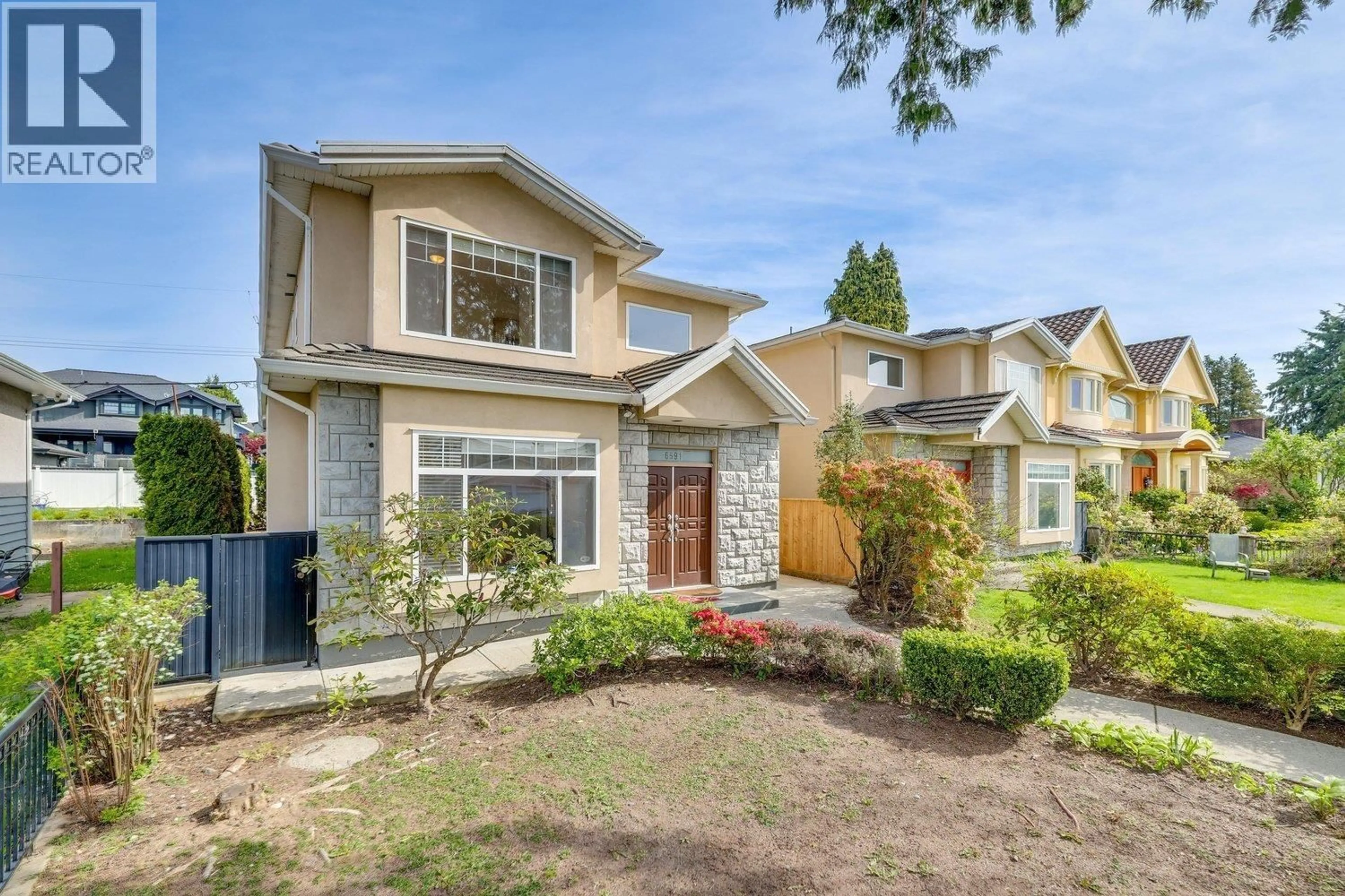 Home with vinyl exterior material, street for 6591 WINCH STREET, Burnaby British Columbia V5B2L5