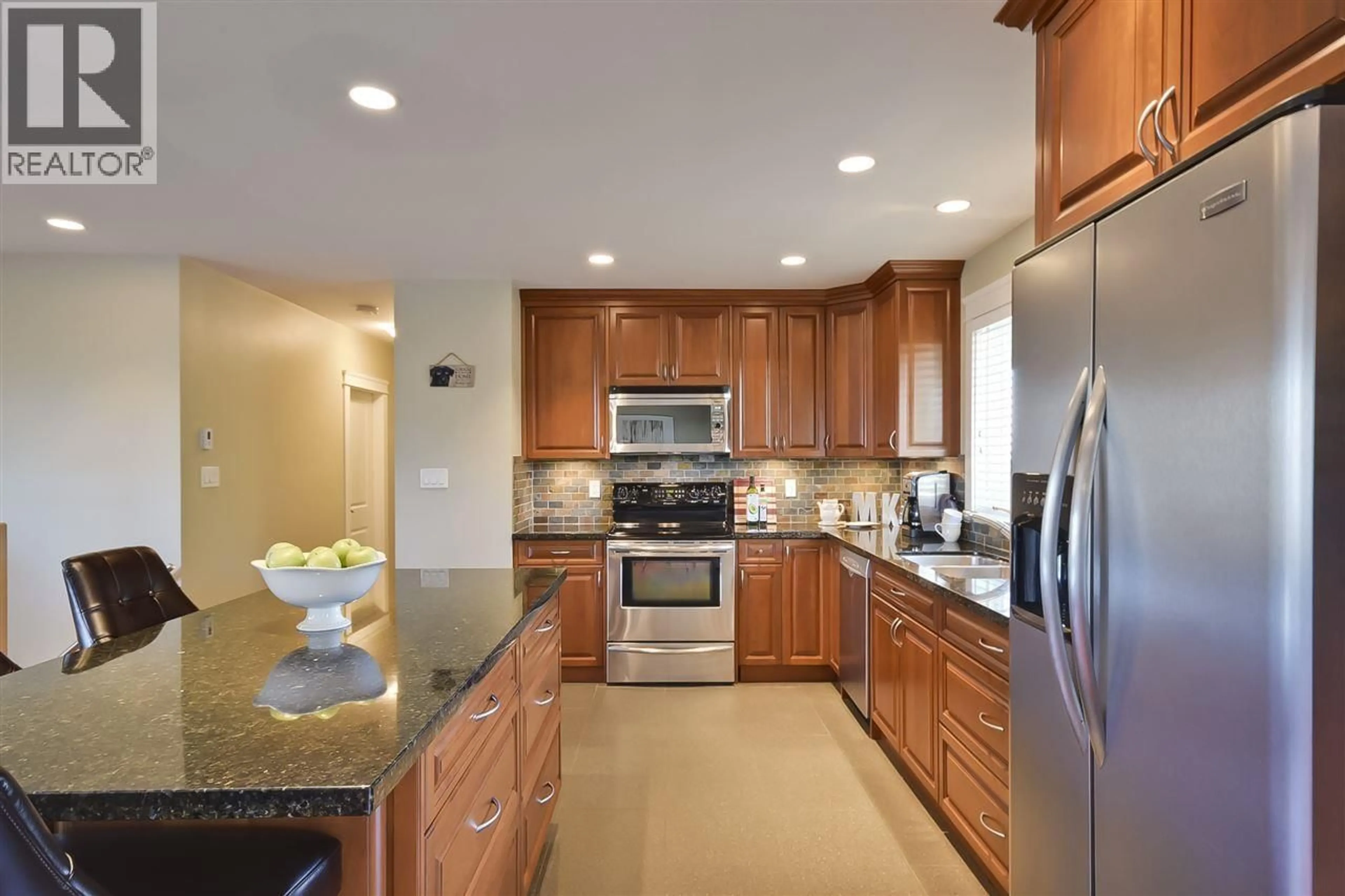 Contemporary kitchen, ceramic/tile floor for 5046 MASSEY DRIVE, Delta British Columbia V4K1B5