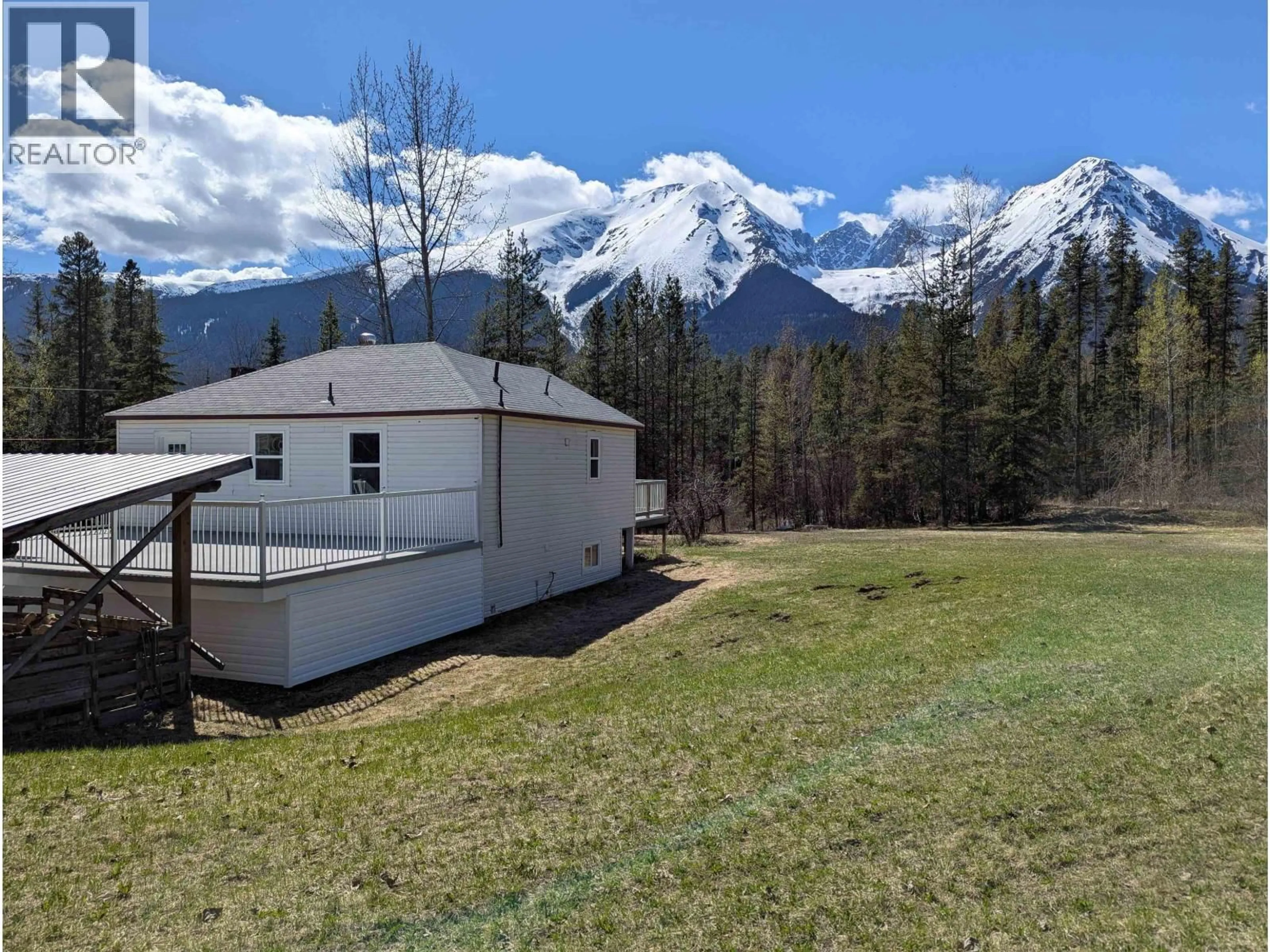 A pic from outside/outdoor area/front of a property/back of a property/a pic from drone, mountain view for 7074 KROEKER ROAD, Smithers British Columbia V0J2N2