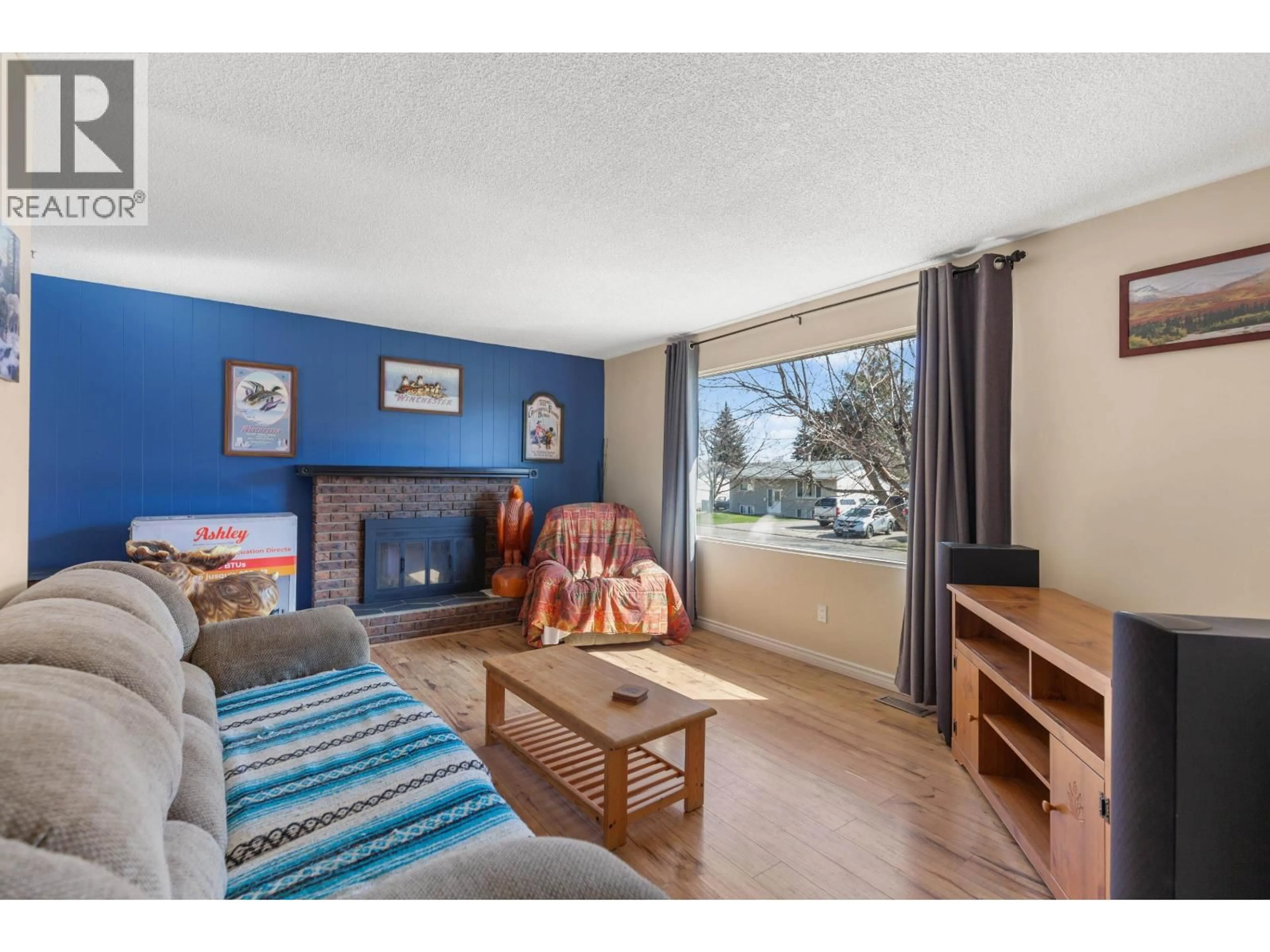 Living room with furniture, wood/laminate floor for 2327 OLDS STREET, Prince George British Columbia V2N3B8