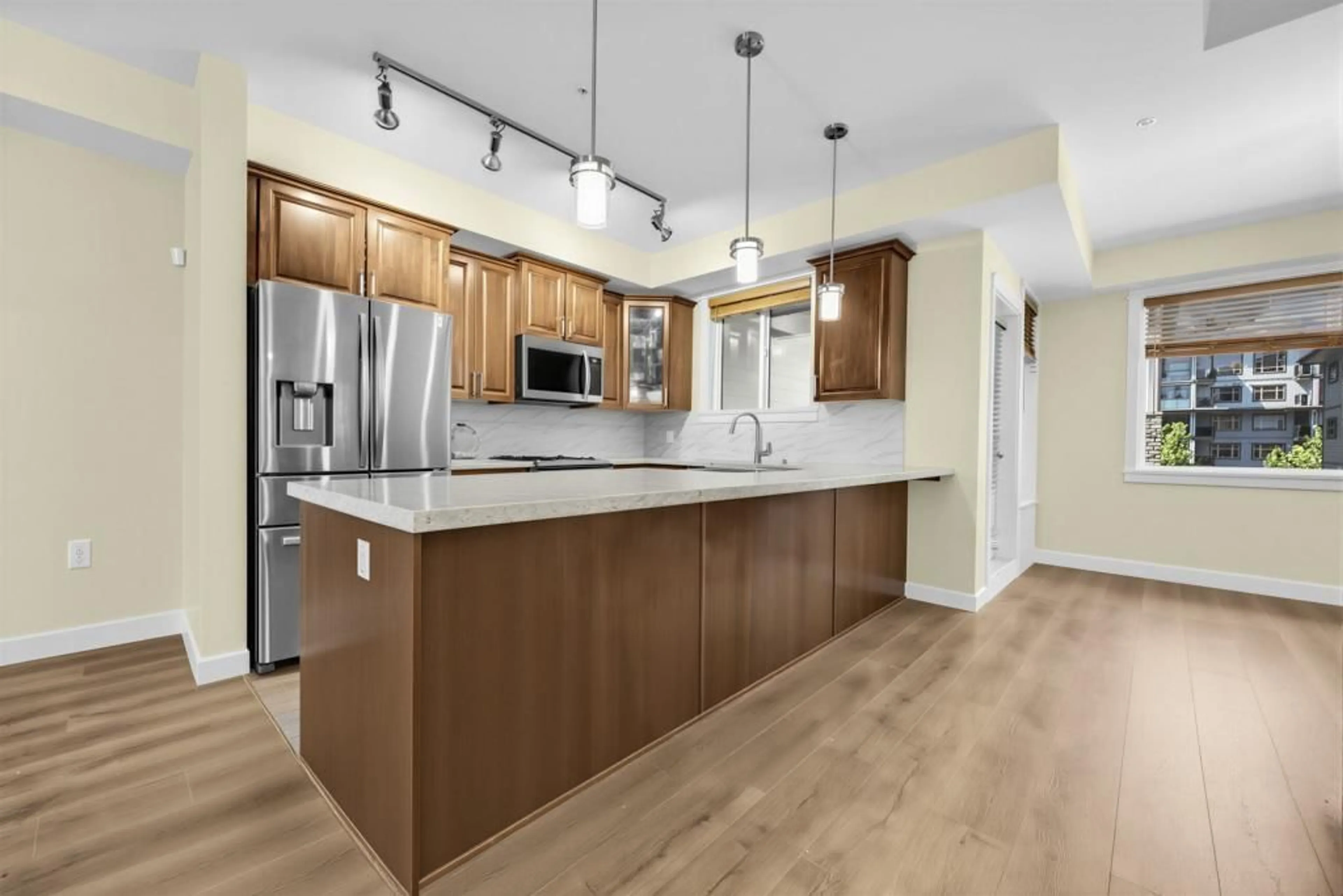 Open concept kitchen, wood/laminate floor for 9 - 8567 204 STREET, Langley British Columbia V2Y3R2