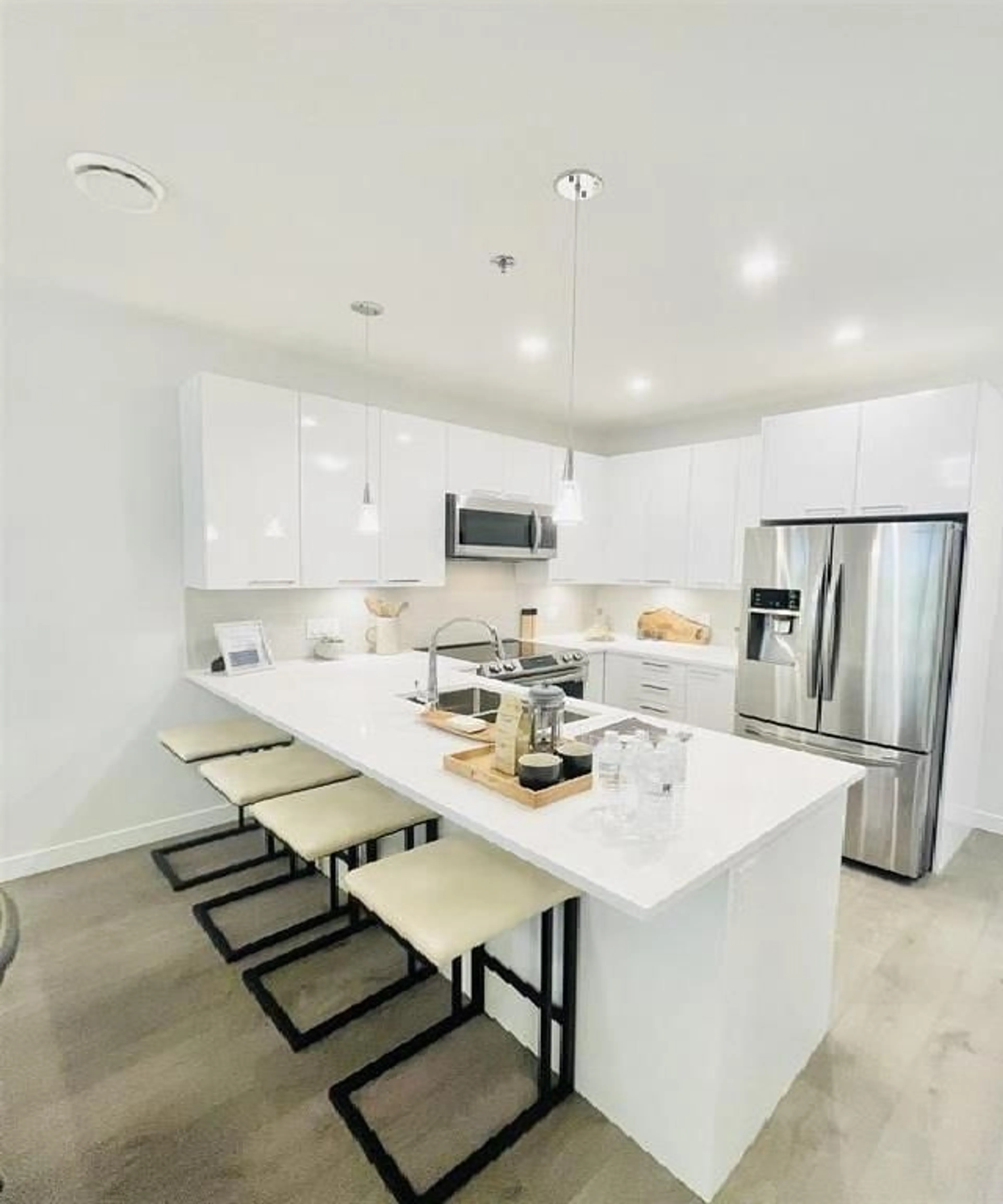 Open concept kitchen, ceramic/tile floor for 601 - 7375 HORNE STREET, Mission British Columbia V2V6T8