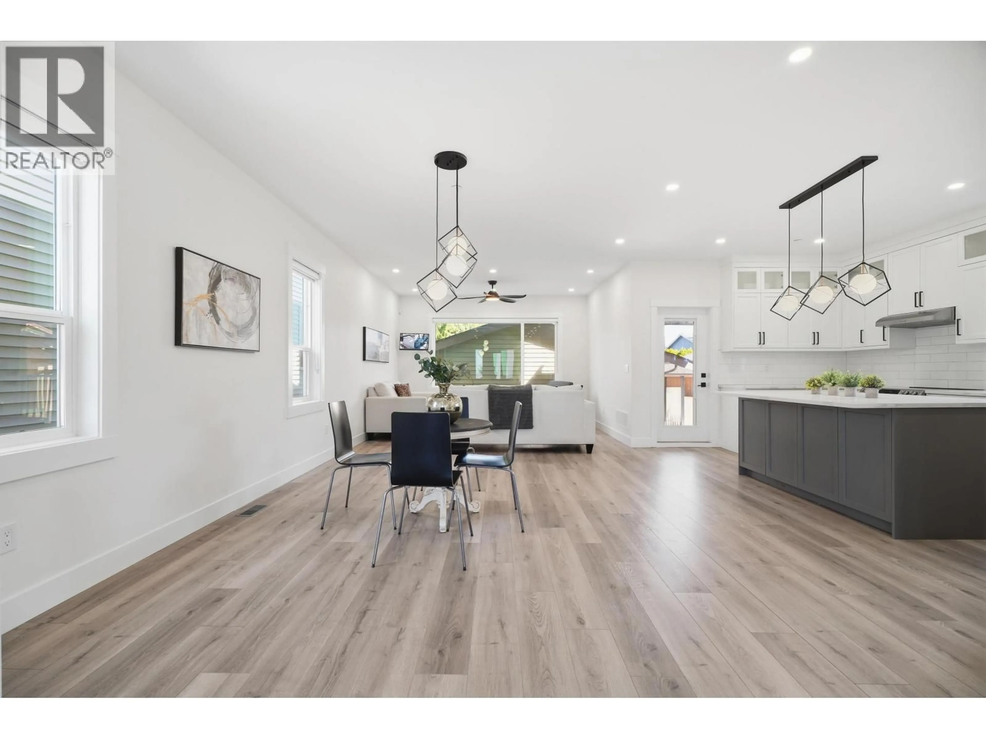 Open concept kitchen, wood/laminate floor for 3858 COAST MERIDIAN ROAD, Port Coquitlam British Columbia V3B2V1