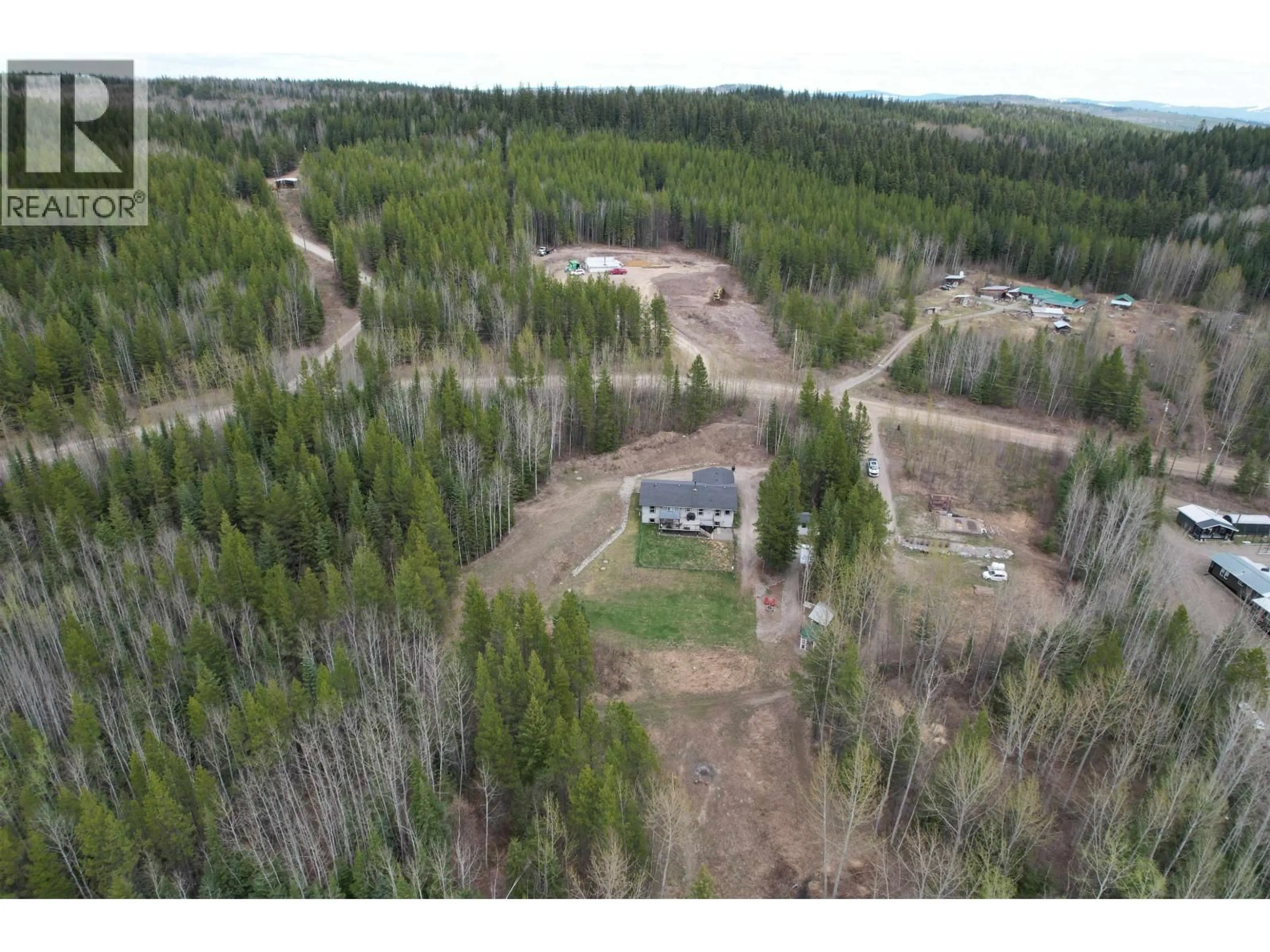 A pic from outside/outdoor area/front of a property/back of a property/a pic from drone, forest/trees view for 1222 HLADY ROAD, Quesnel British Columbia V2J6X8