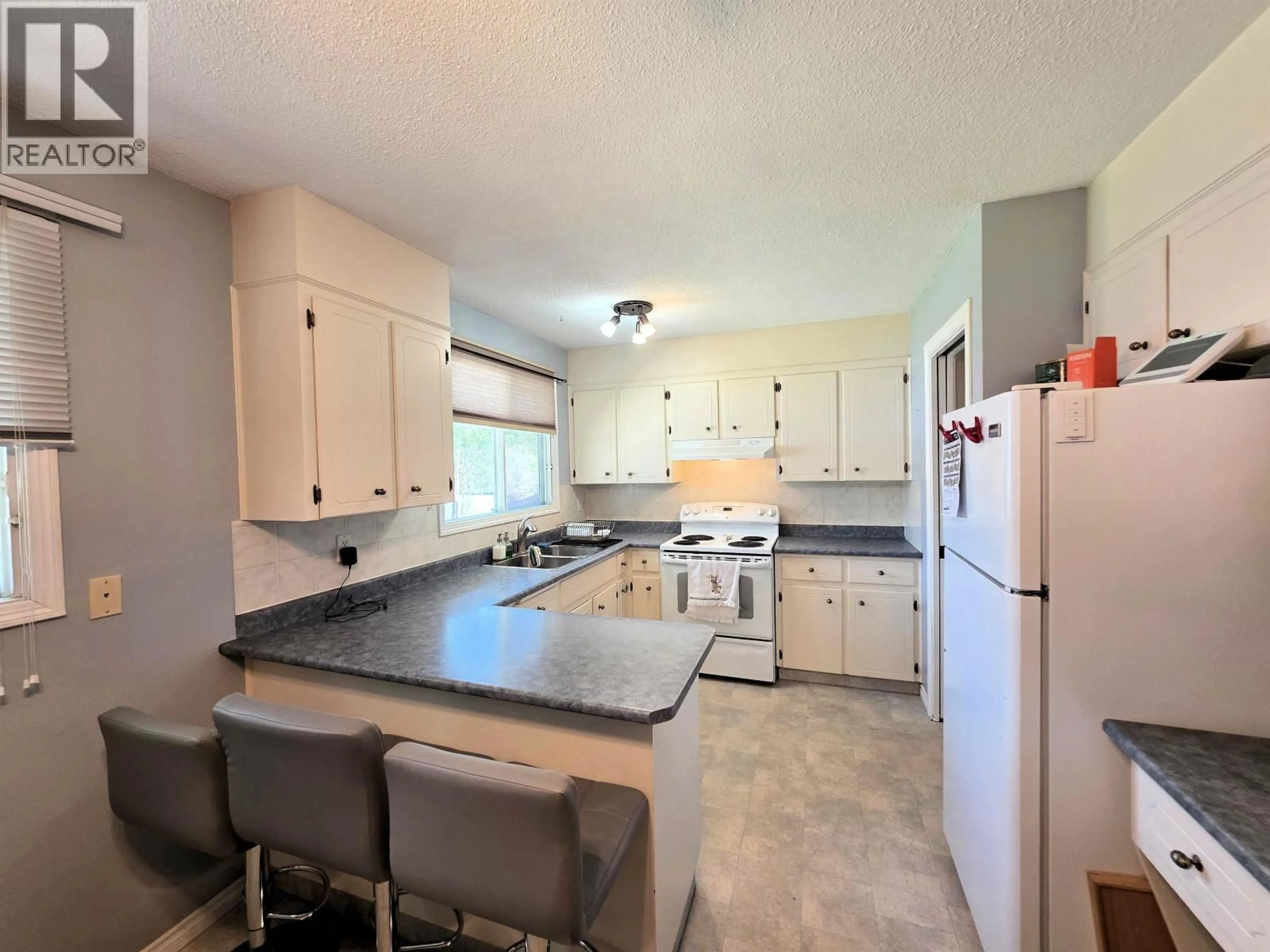 Open concept kitchen, ceramic/tile floor for 358 MCPHERSON PLACE, Prince George British Columbia V2M4S6