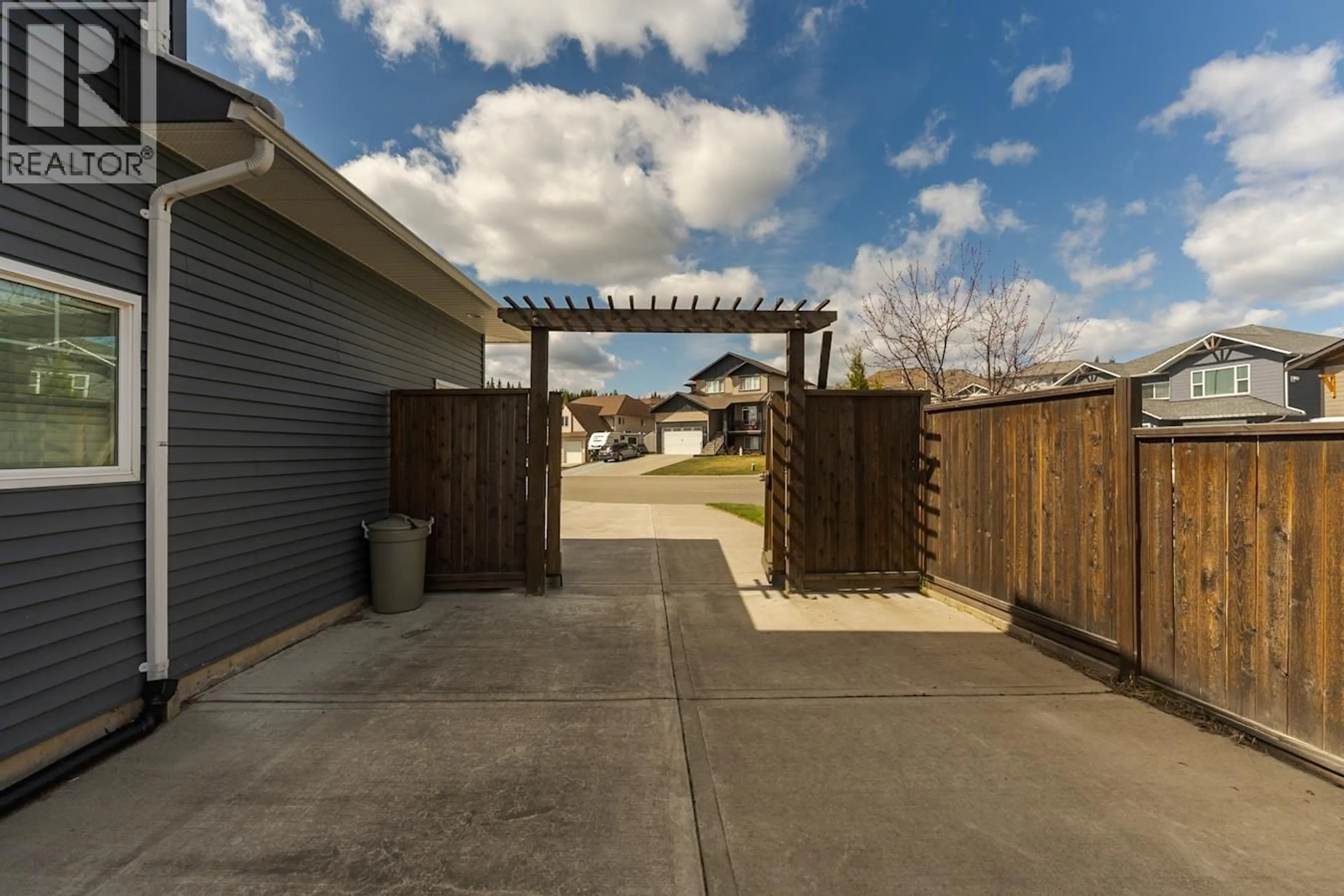 A pic from outside/outdoor area/front of a property/back of a property/a pic from drone, street for 7658 ST ANDREW PLACE, Prince George British Columbia V2N0B6