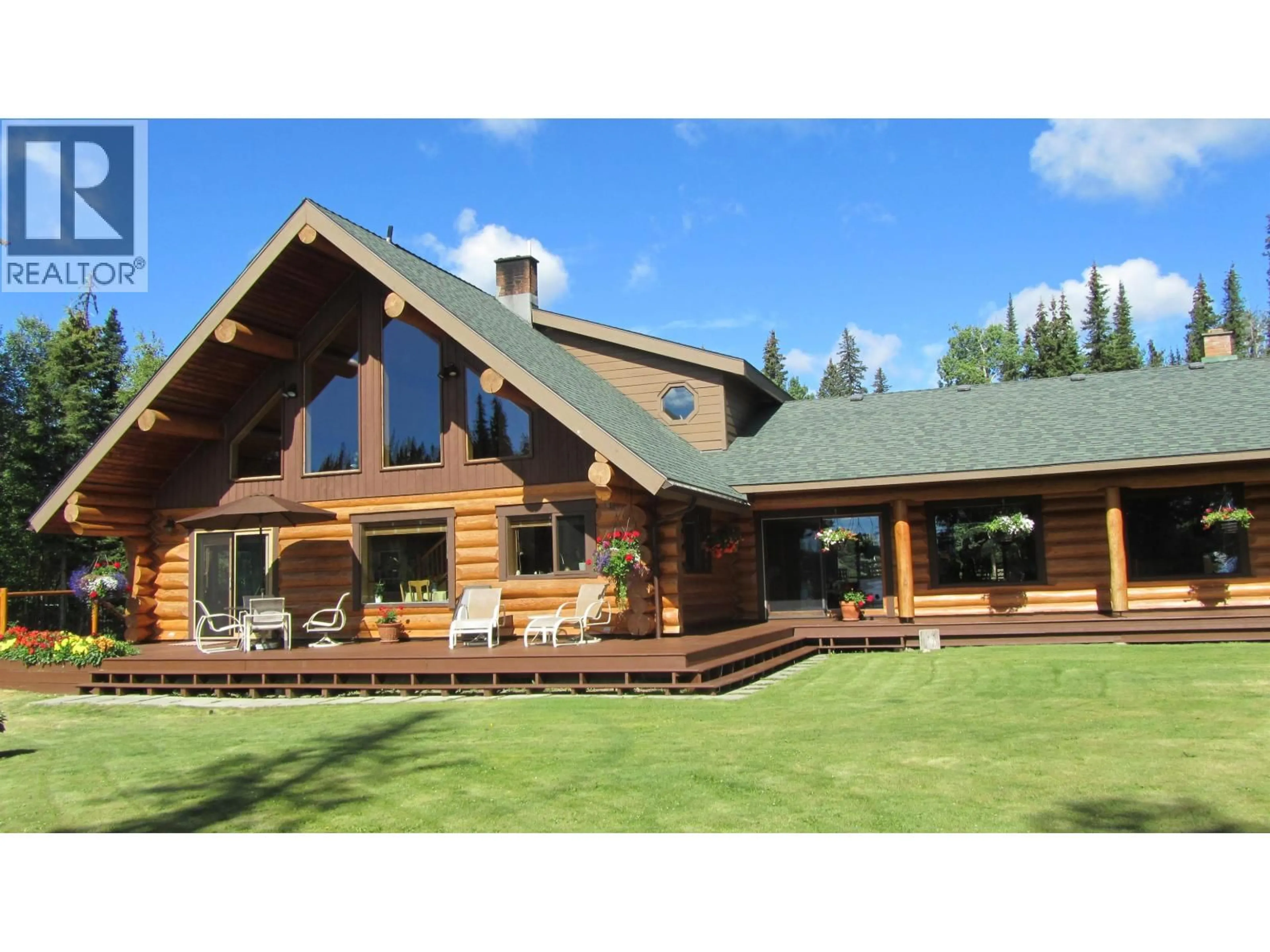 Home with vinyl exterior material, mountain view for 8528 LITTLE FORT HWY 24, Bridge Lake British Columbia V0K1E0