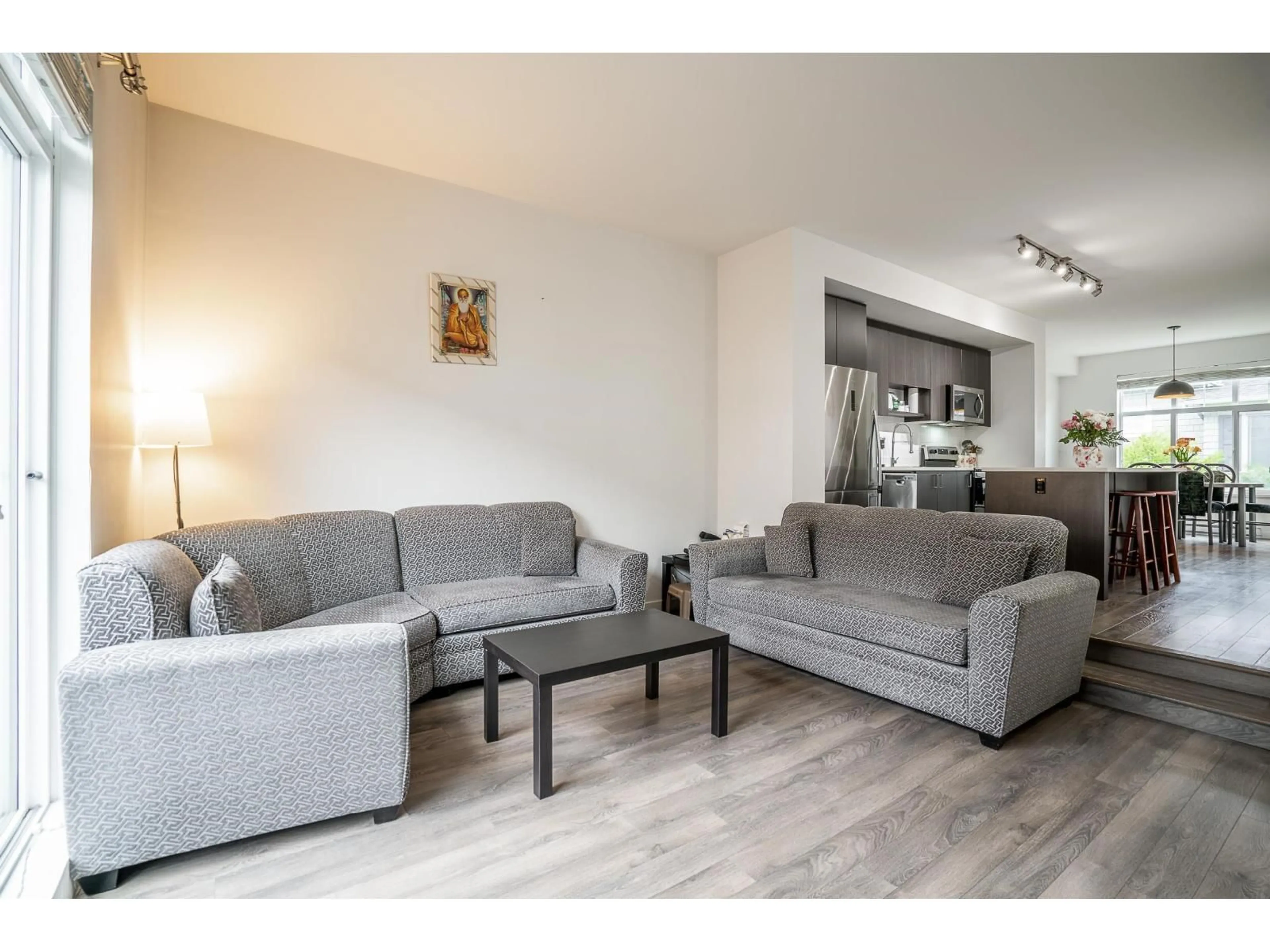 Living room with furniture, wood/laminate floor for 69 - 8130 136A STREET, Surrey British Columbia V3W1H9