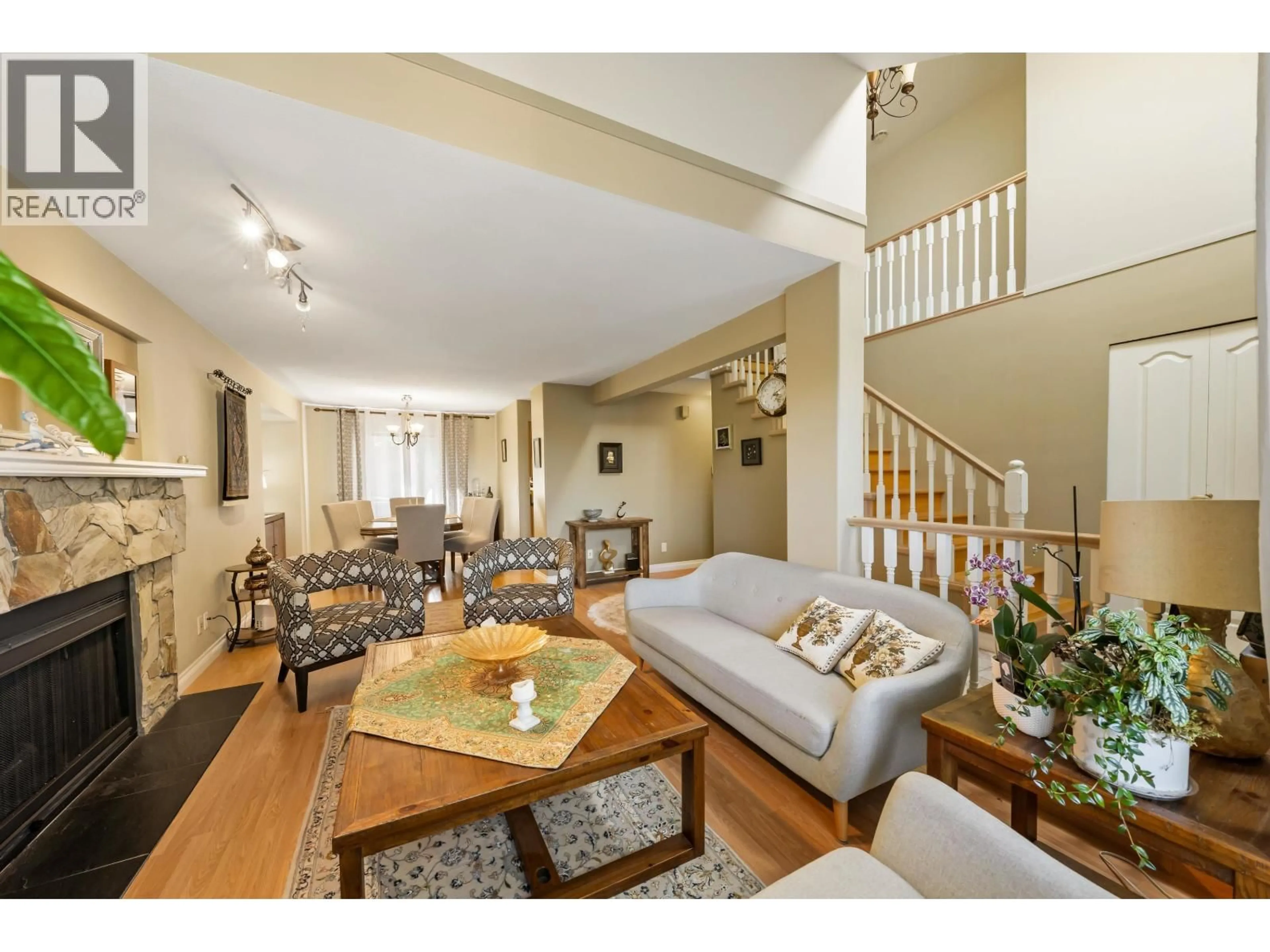 Living room with furniture, wood/laminate floor for 1410 MOUNTAINVIEW COURT, Coquitlam British Columbia V3E2R9