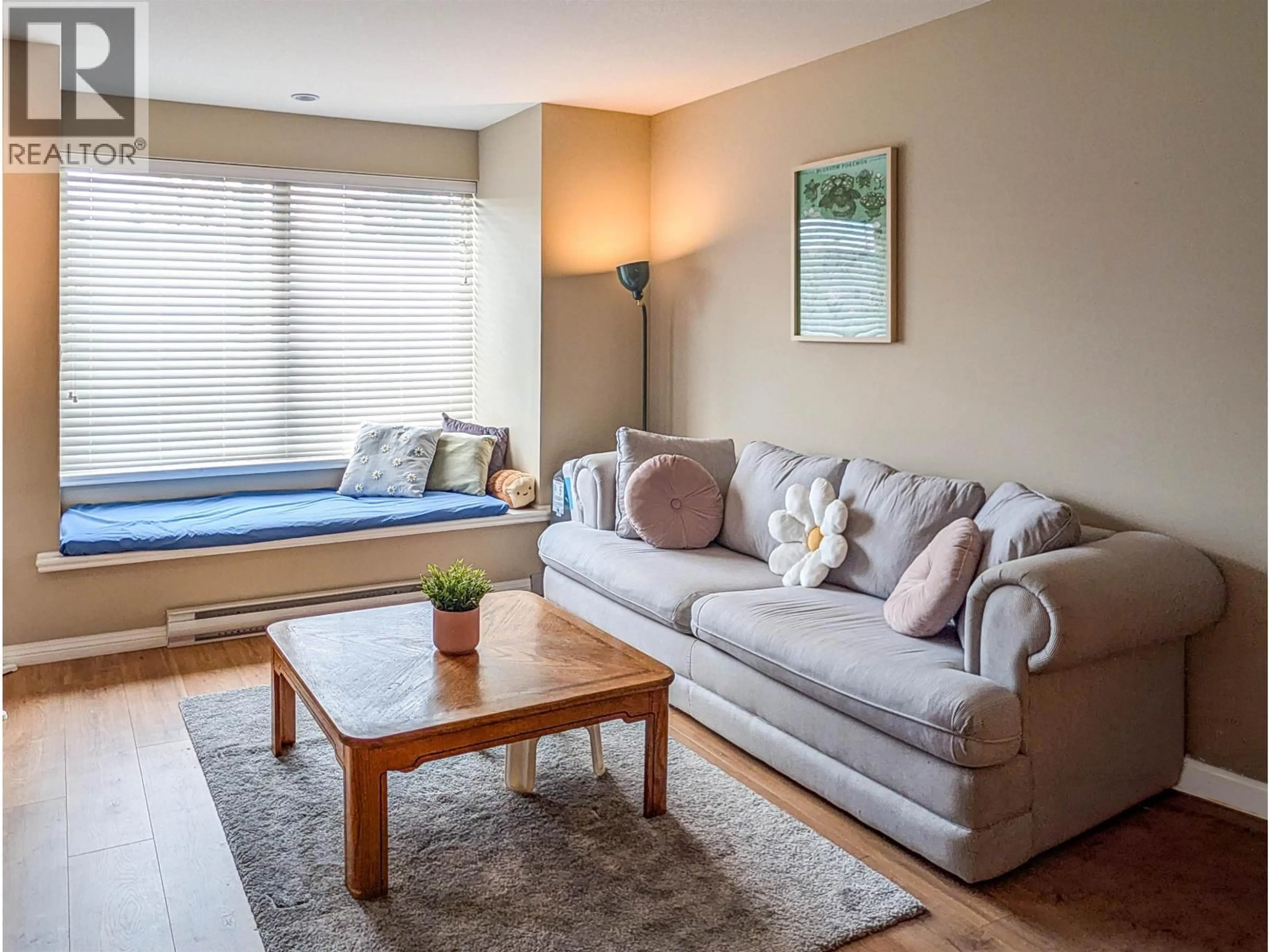 Living room with furniture, wood/laminate floor for 204 - 5000 IMPERIAL STREET, Burnaby British Columbia V5J1C8