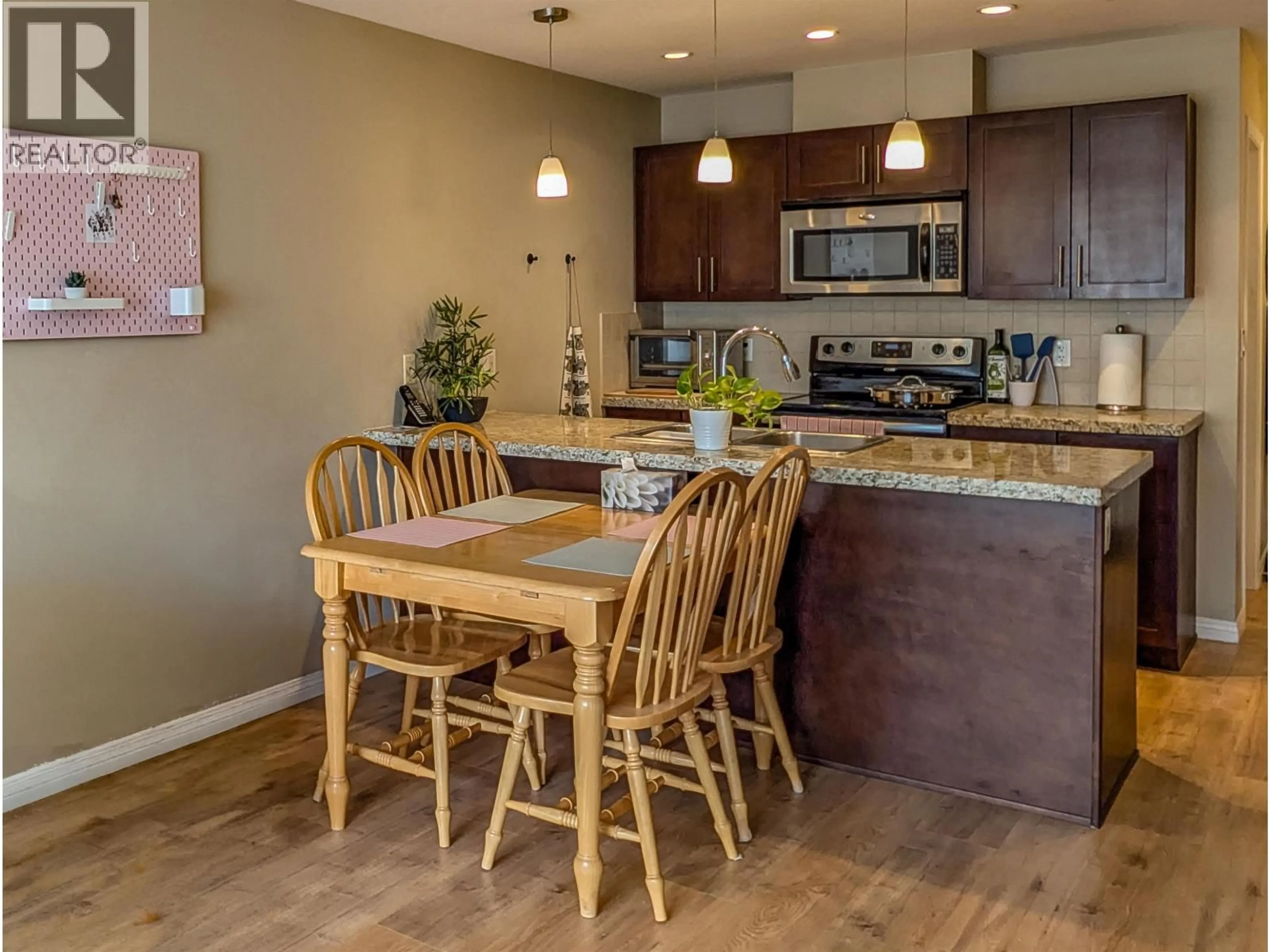 Open concept kitchen, wood/laminate floor for 204 - 5000 IMPERIAL STREET, Burnaby British Columbia V5J1C8