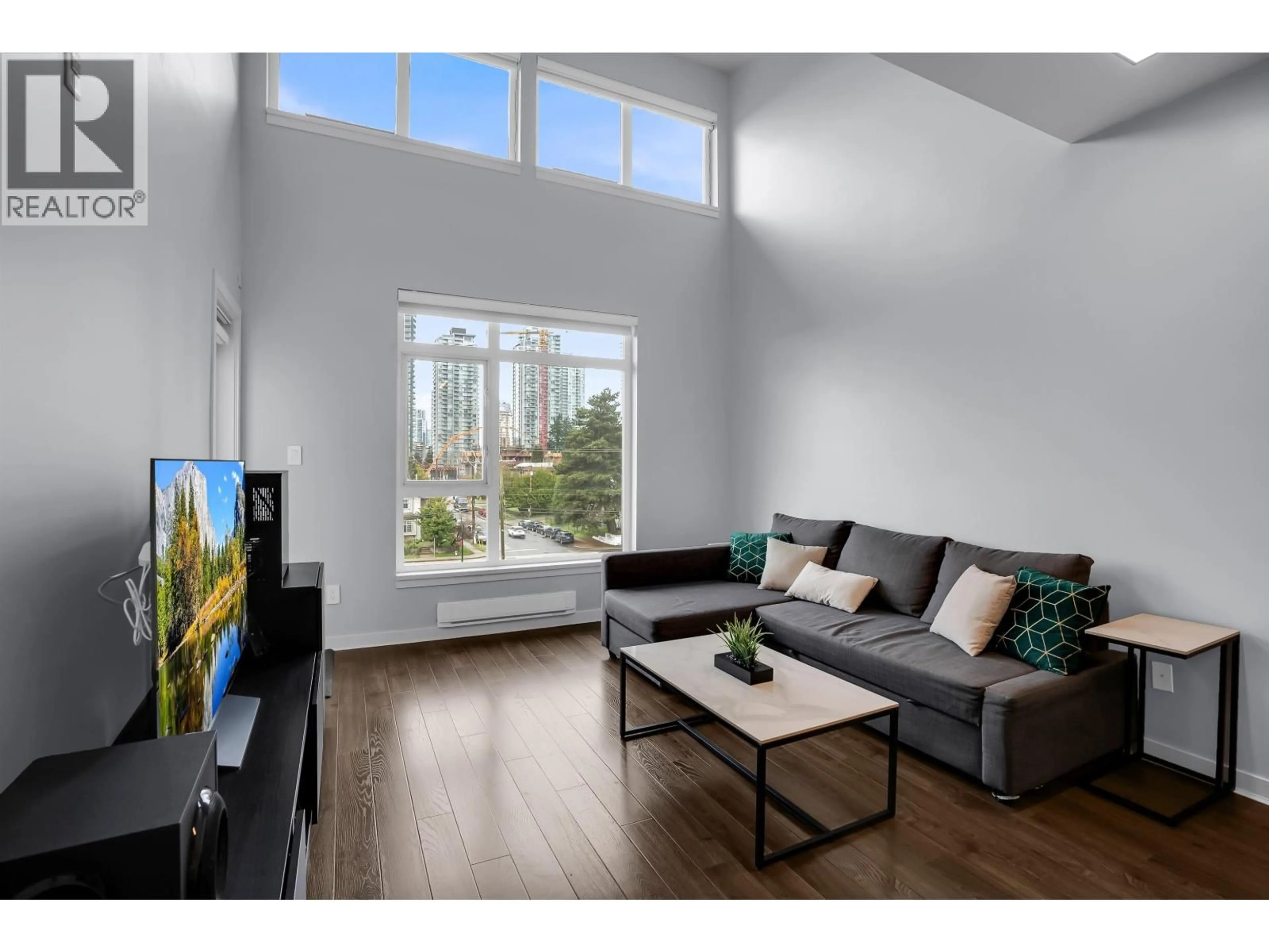 Living room with furniture, wood/laminate floor for PH5 - 5248 GRIMMER STREET, Burnaby British Columbia V5H0E1