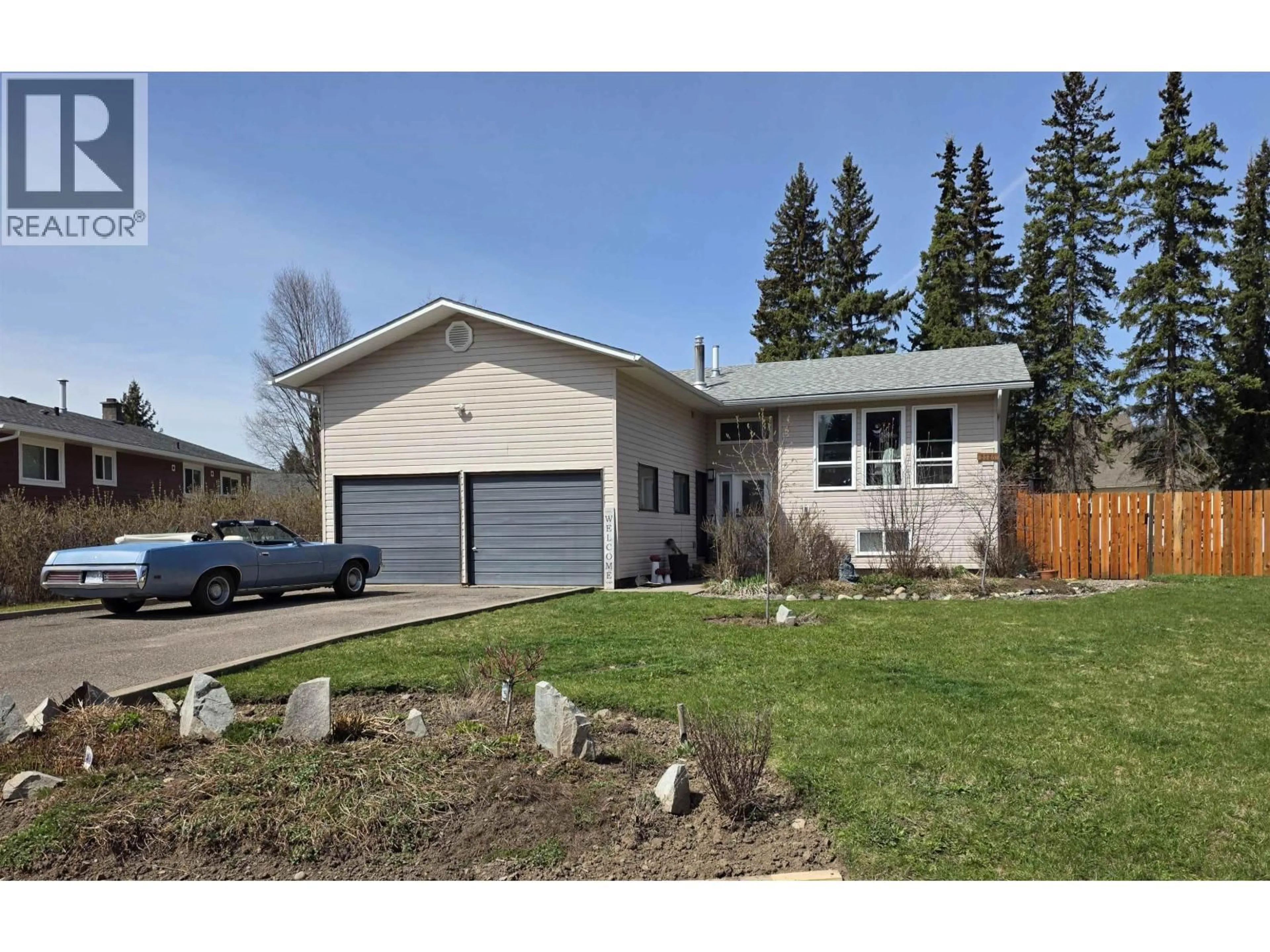 Home with vinyl exterior material, street for 2325 OMINECA PLACE, Houston British Columbia V0J1Z2