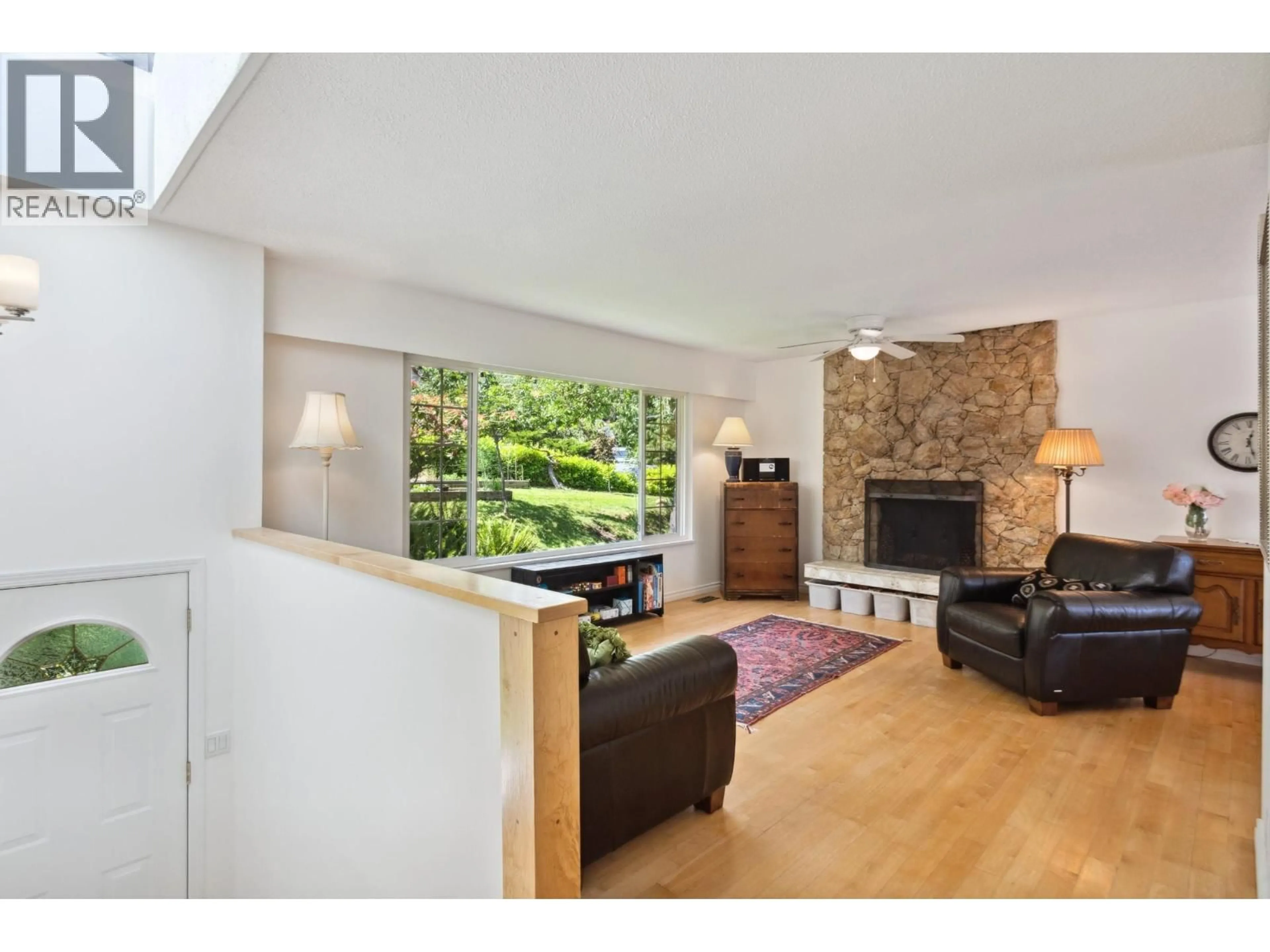 Living room with furniture, wood/laminate floor for 1130 TUXEDO DRIVE, Port Moody British Columbia V3H1L4