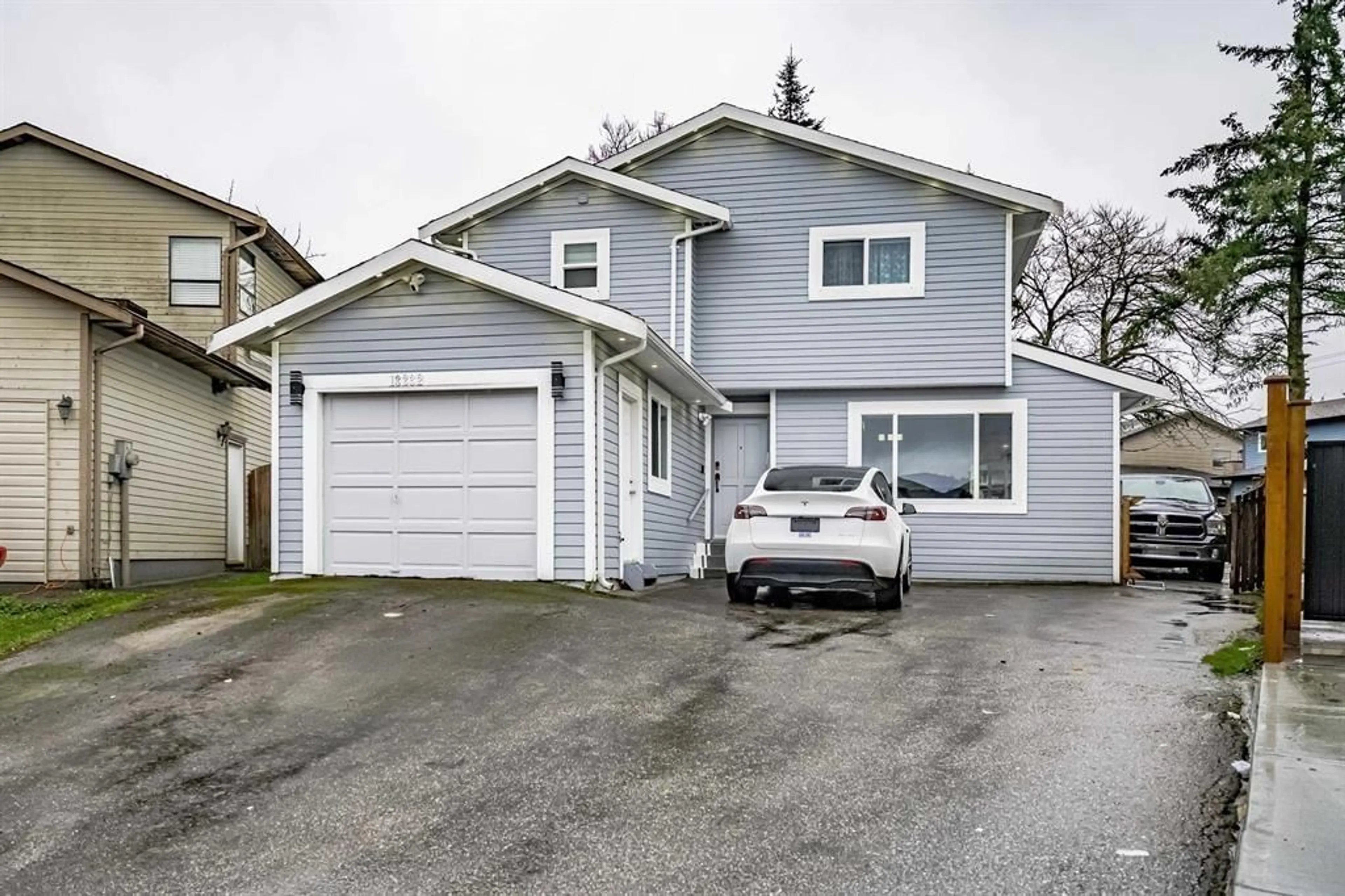 Home with vinyl exterior material, street for 13232 82 AVENUE, Surrey British Columbia V3W8Z4