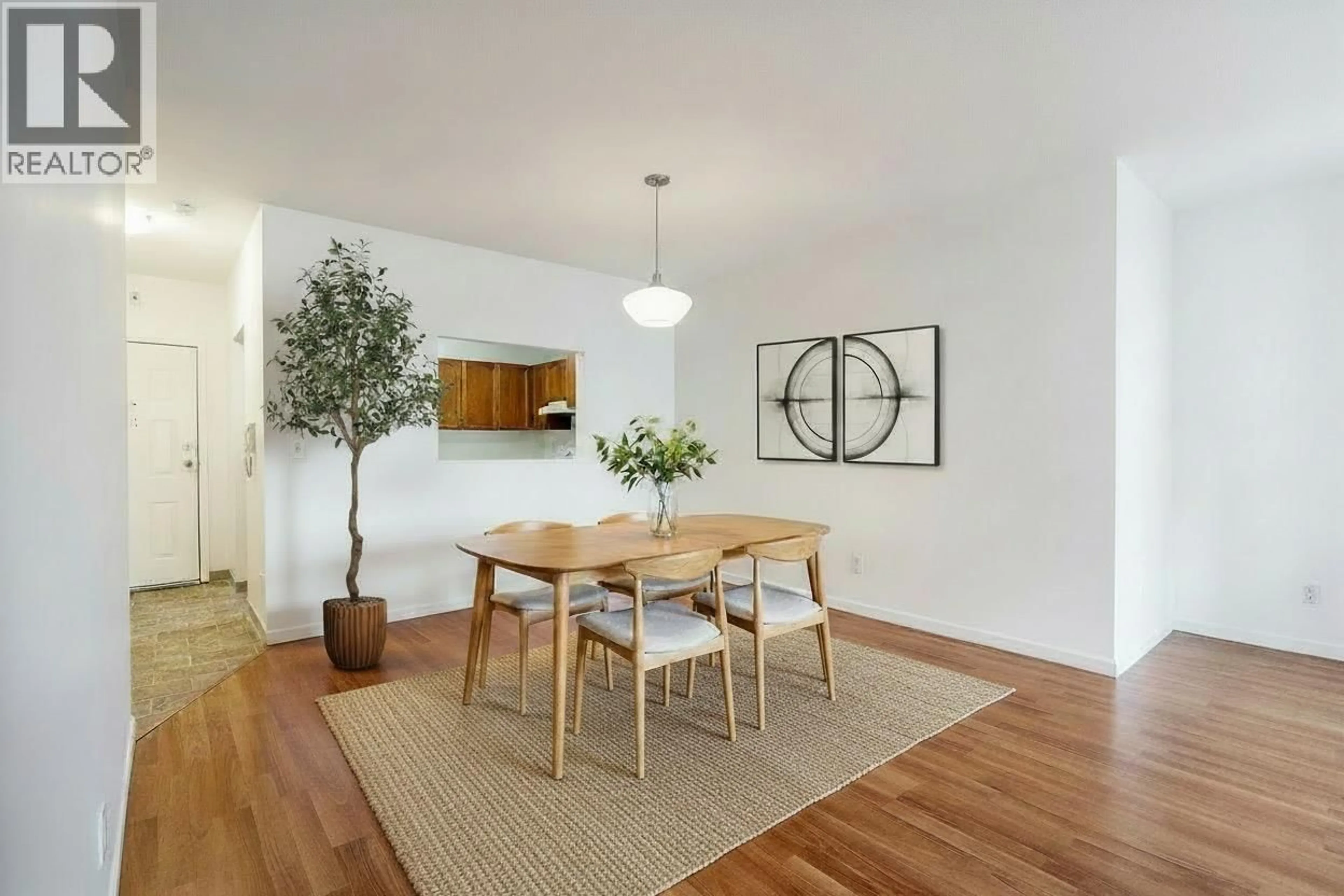 Dining room, wood/laminate floor for 208 - 4989 47 AVENUE, Ladner British Columbia V4K1R1