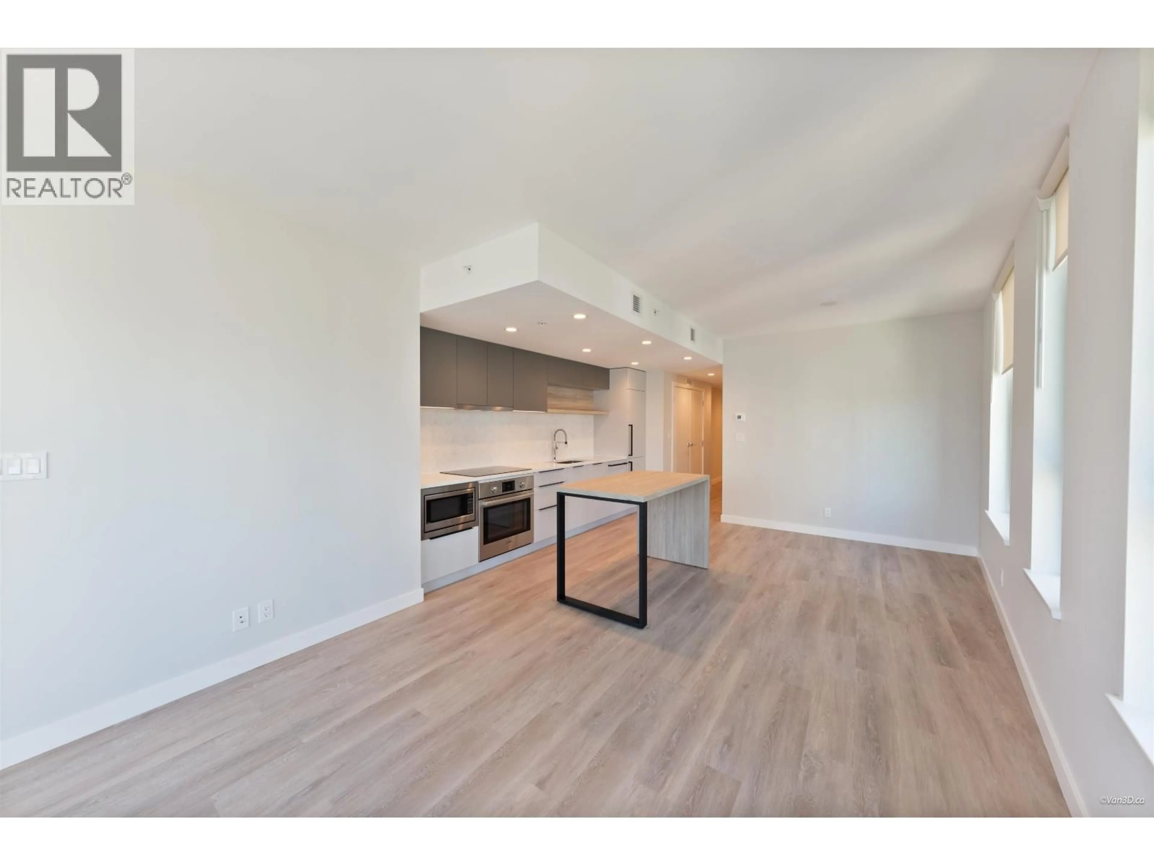 Open concept kitchen, wood/laminate floor for 1105 - 567 EMERSON STREET, Coquitlam British Columbia V3J0M8