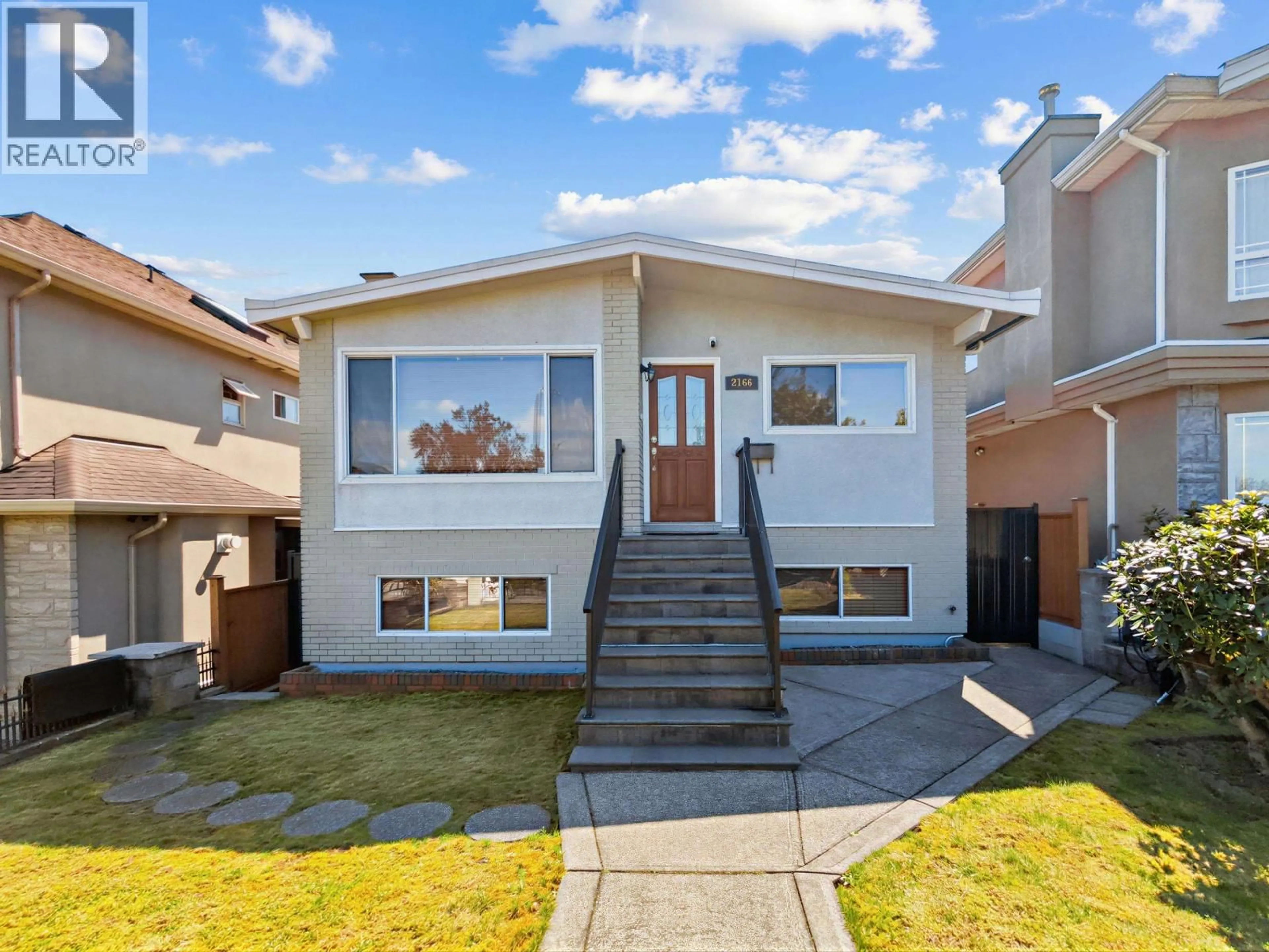 Home with vinyl exterior material, street for 2166 39TH AVENUE, Vancouver British Columbia V5P1H7