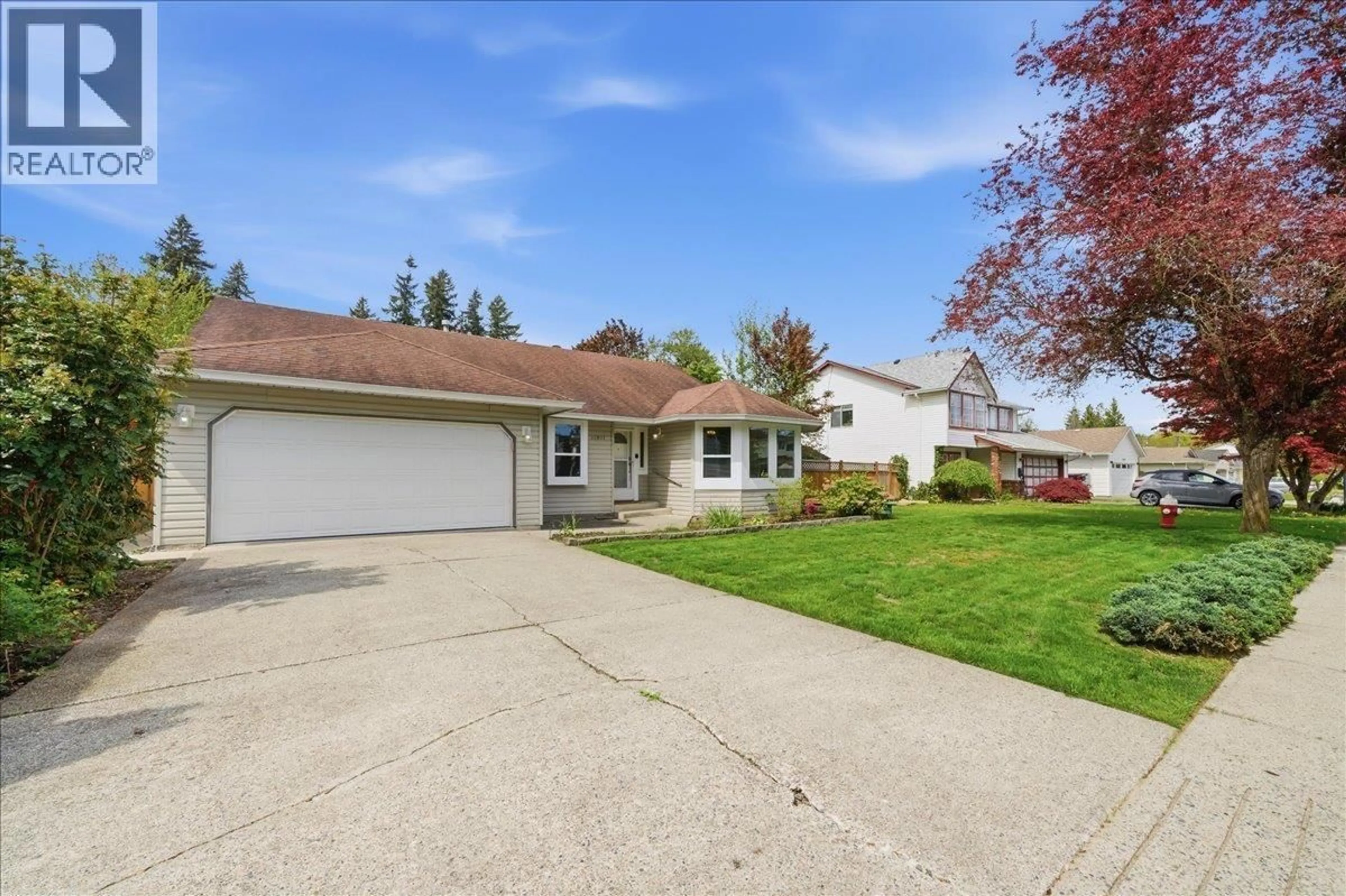Home with vinyl exterior material, street for 11911 238B STREET, Maple Ridge British Columbia V4R1W3