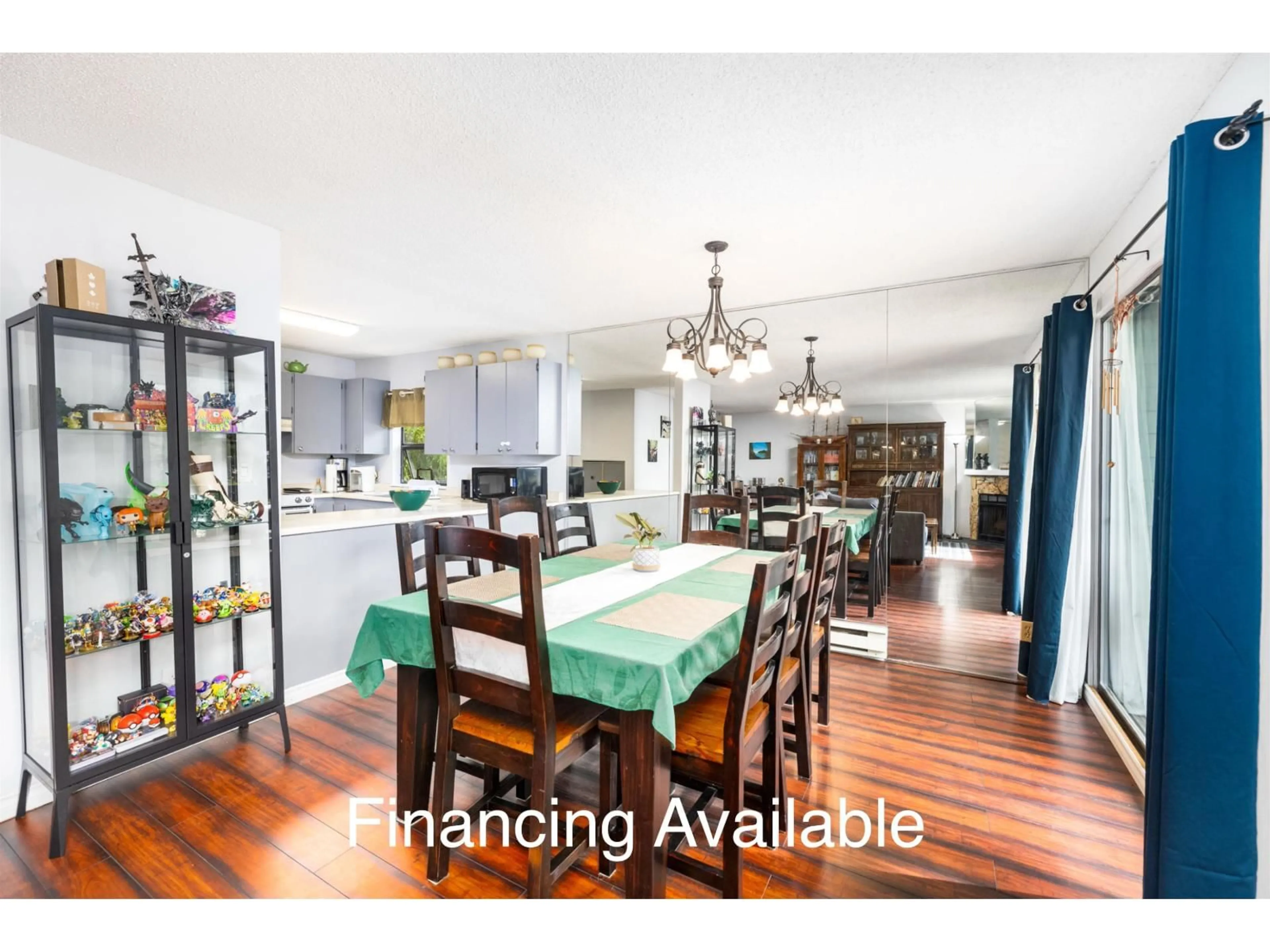 Dining room, wood/laminate floor for 201 - 7064 133B STREET, Surrey British Columbia V3W8A4