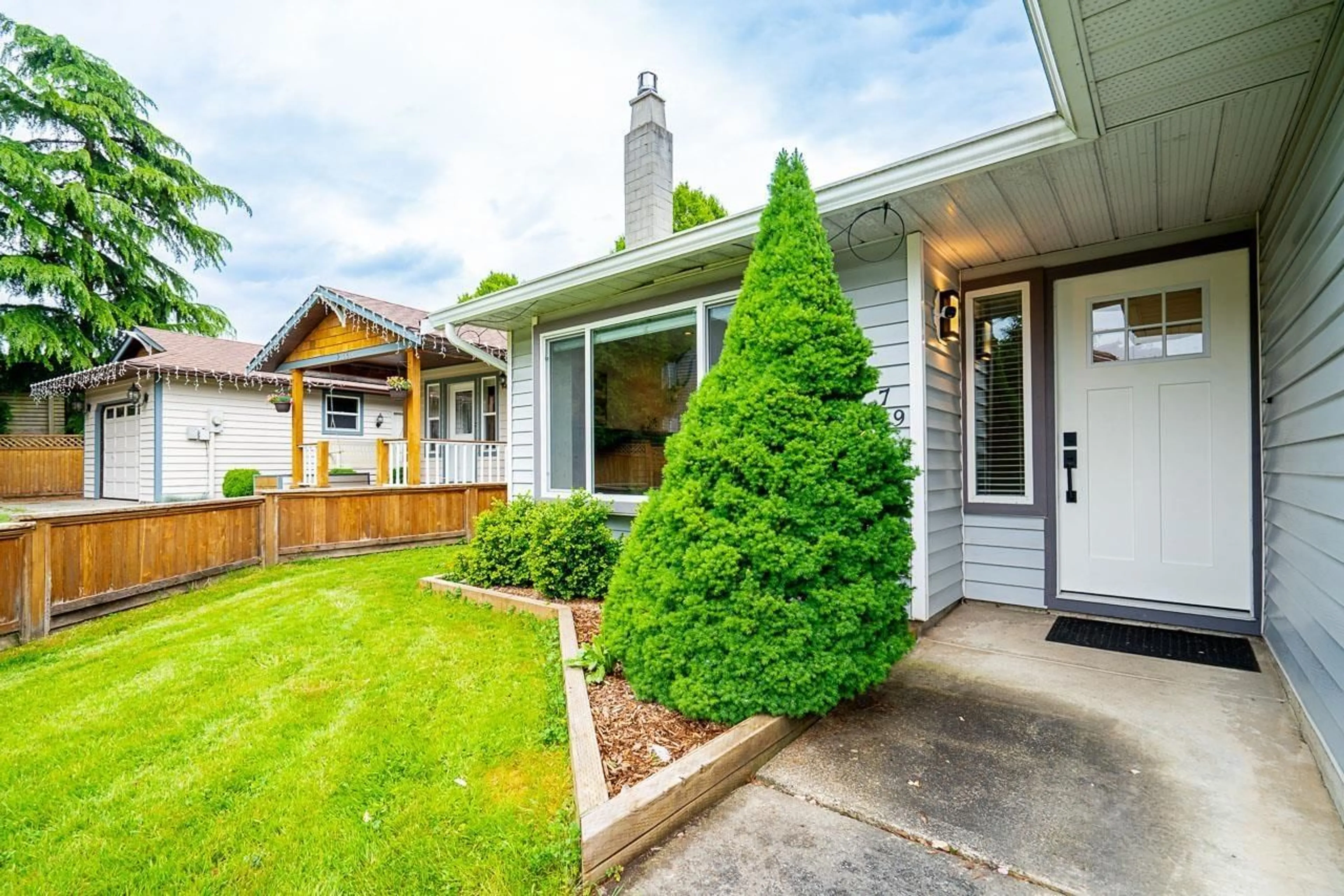 Home with vinyl exterior material, street for 21579 94A AVENUE, Langley British Columbia V1M2A5
