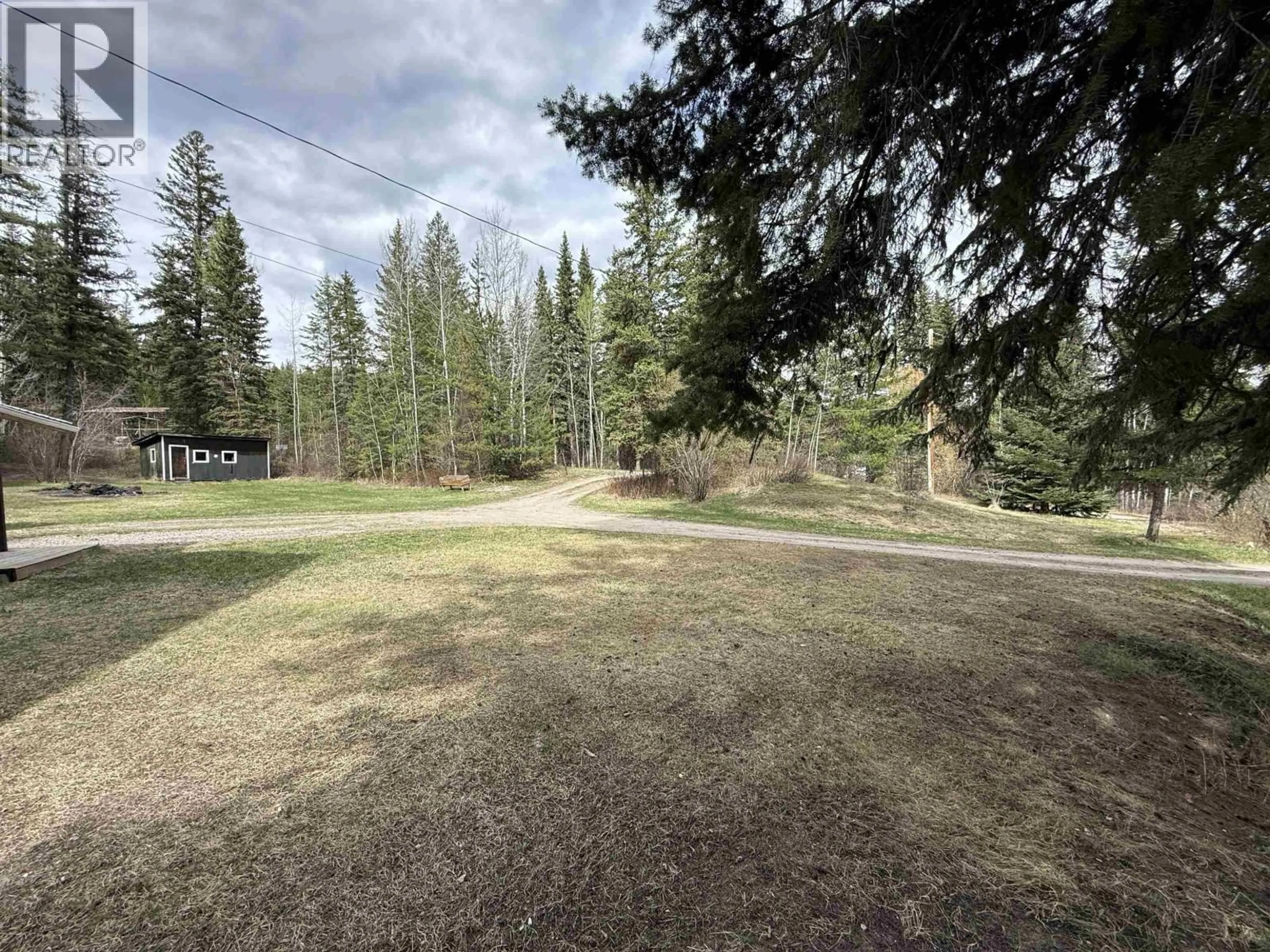 A pic from outside/outdoor area/front of a property/back of a property/a pic from drone, forest/trees view for 678 DICK ROAD, Quesnel British Columbia V2J6W9