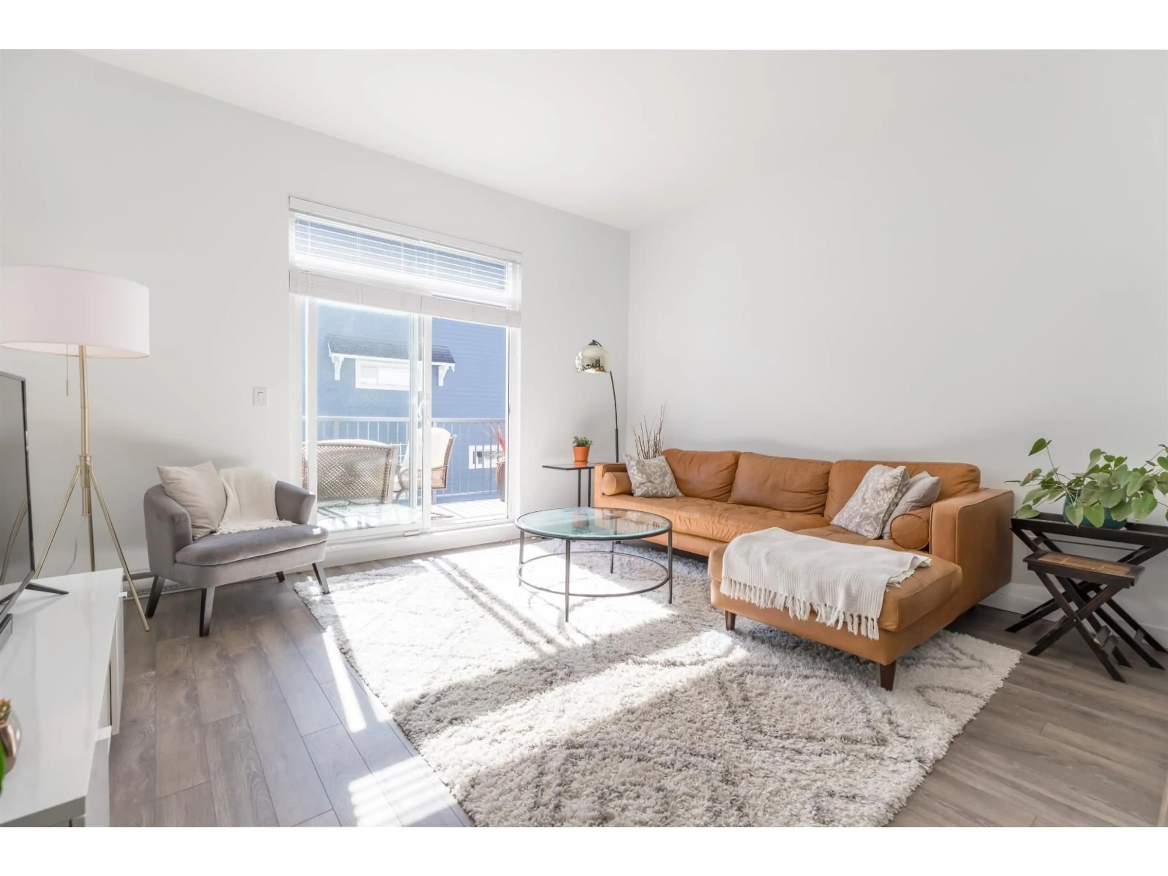 Living room with furniture, wood/laminate floor for 80 - 158 171 STREET, Surrey British Columbia V3Z0X1
