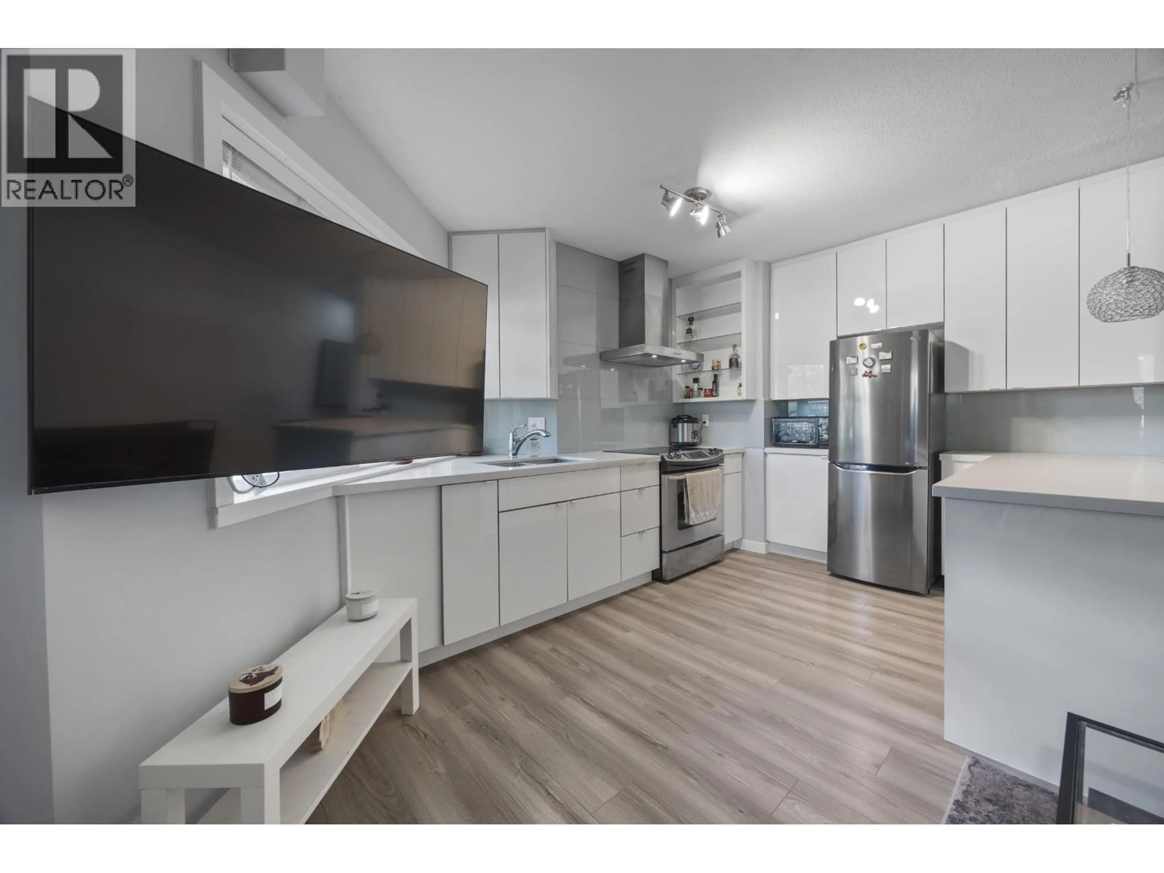 Open concept kitchen, unknown for 106 - 1988 37TH AVENUE, Vancouver British Columbia V5P1G1