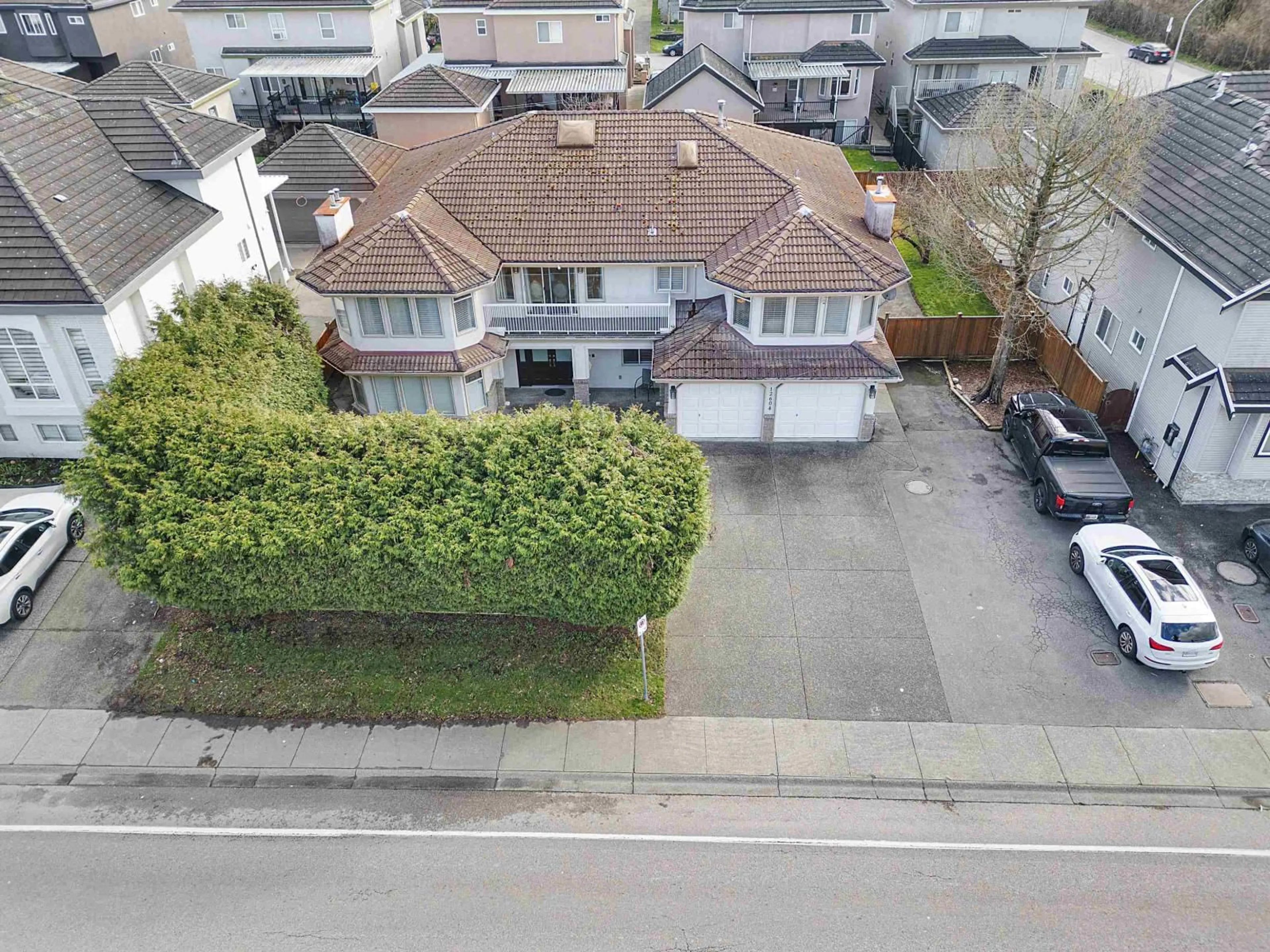 A pic from outside/outdoor area/front of a property/back of a property/a pic from drone, street for 12604 68 AVENUE, Surrey British Columbia V3W1G4