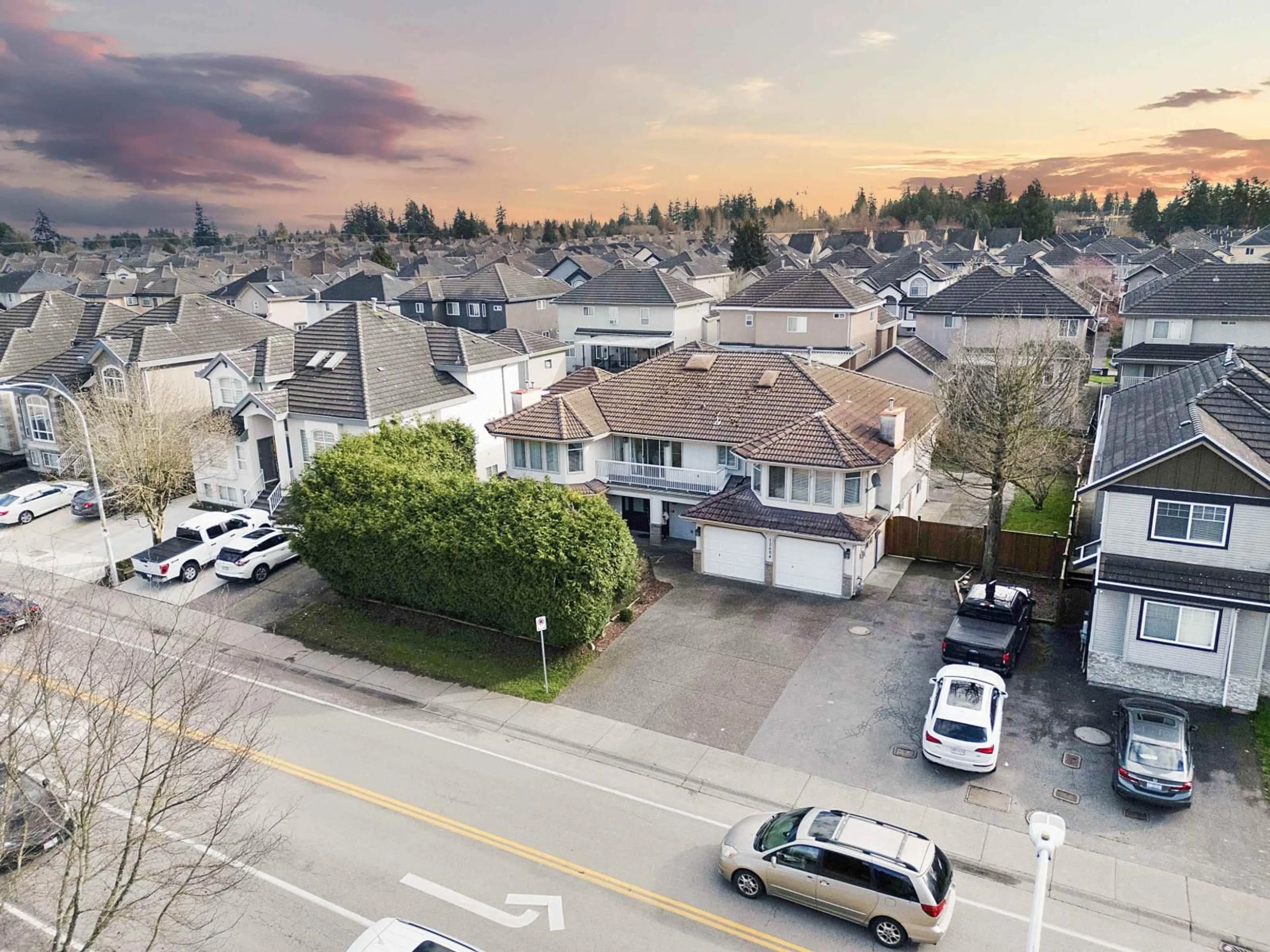 A pic from outside/outdoor area/front of a property/back of a property/a pic from drone, street for 12604 68 AVENUE, Surrey British Columbia V3W1G4
