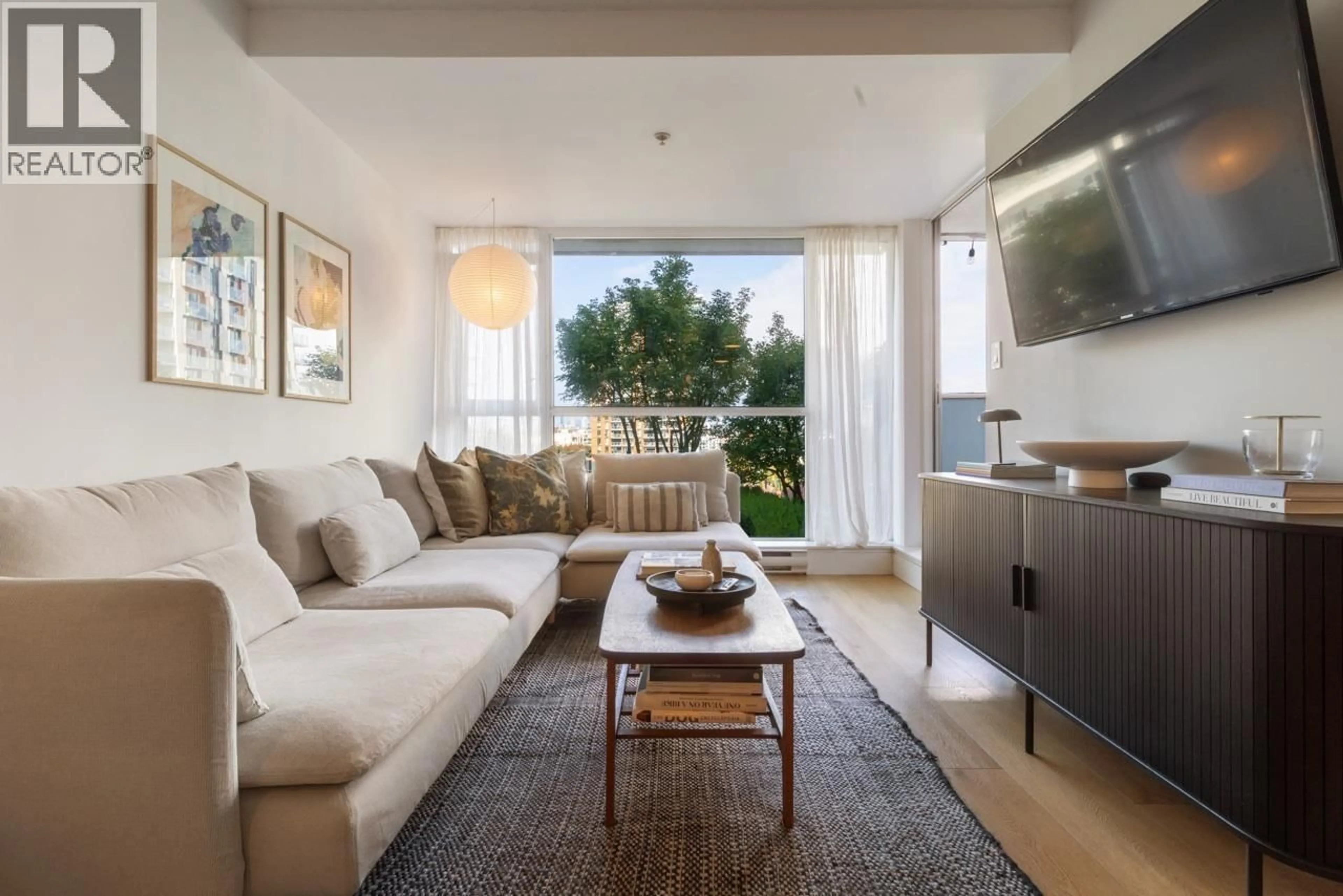 Living room with furniture, unknown for 404 - 2770 SOPHIA STREET, Vancouver British Columbia V5T0A4