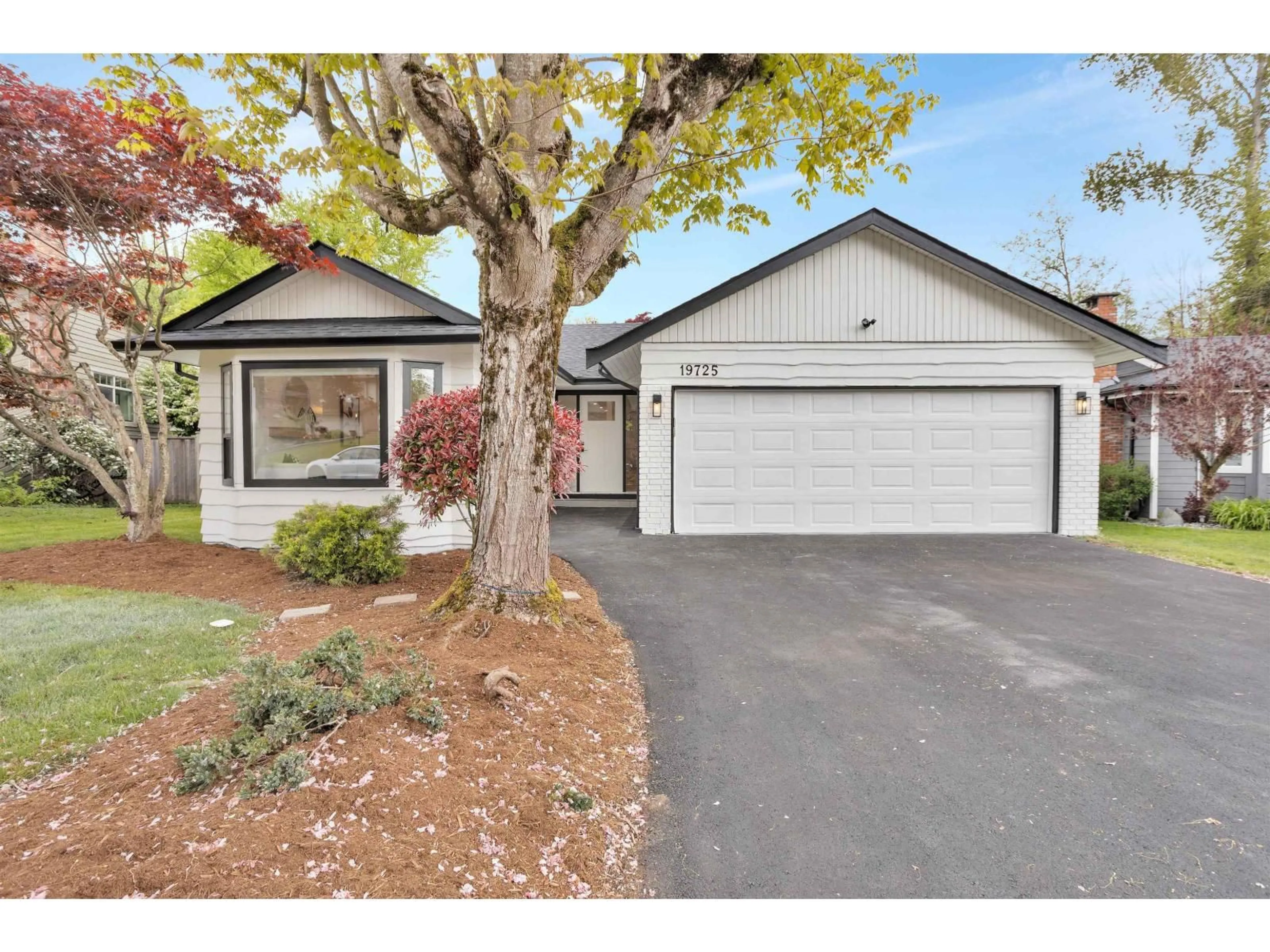 Home with vinyl exterior material, street for 19725 50A AVENUE, Langley British Columbia V3A7L1
