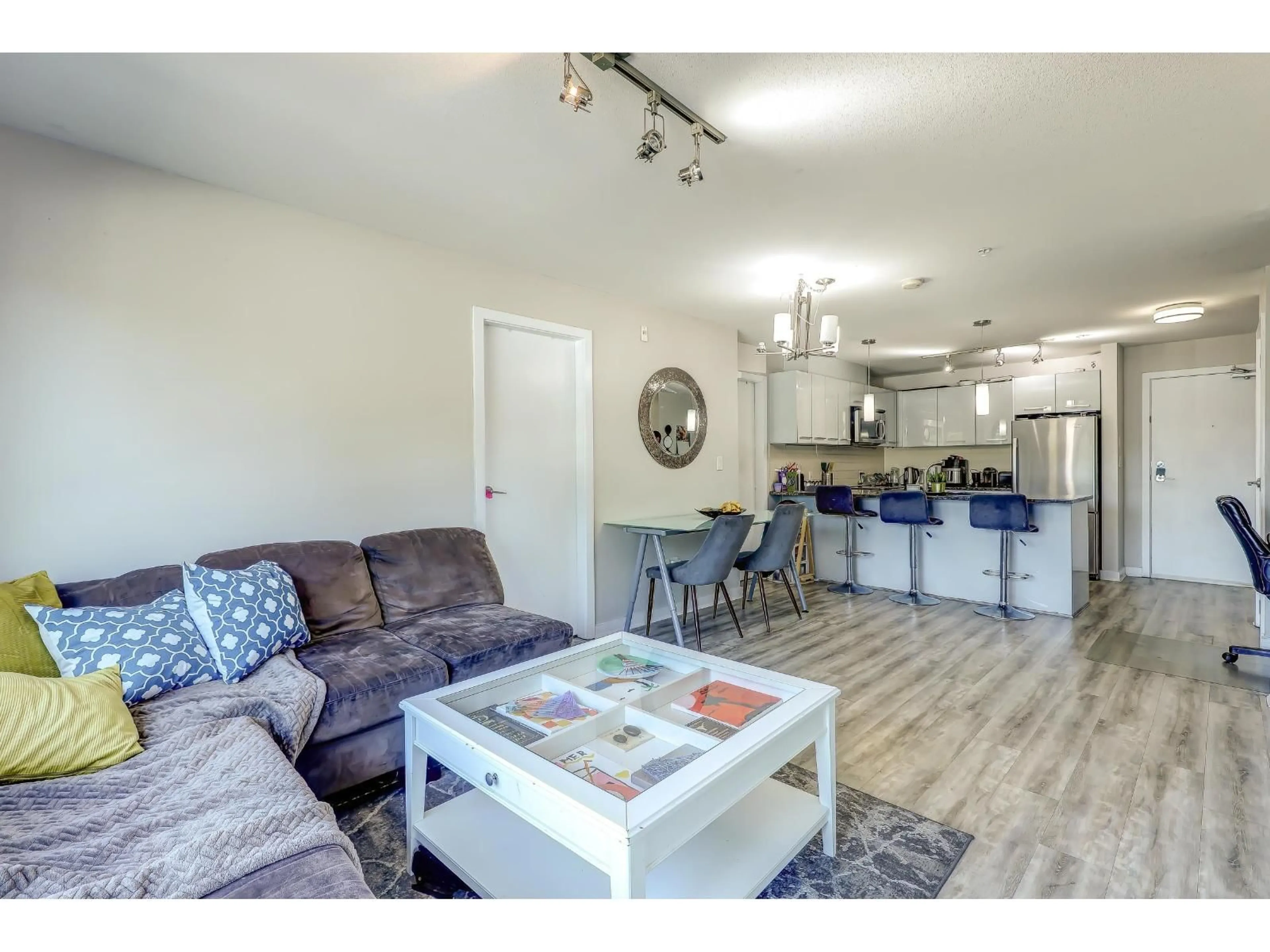 Open concept kitchen, wood/laminate floor for 211 - 7511 120 STREET, Delta British Columbia V4C0C1