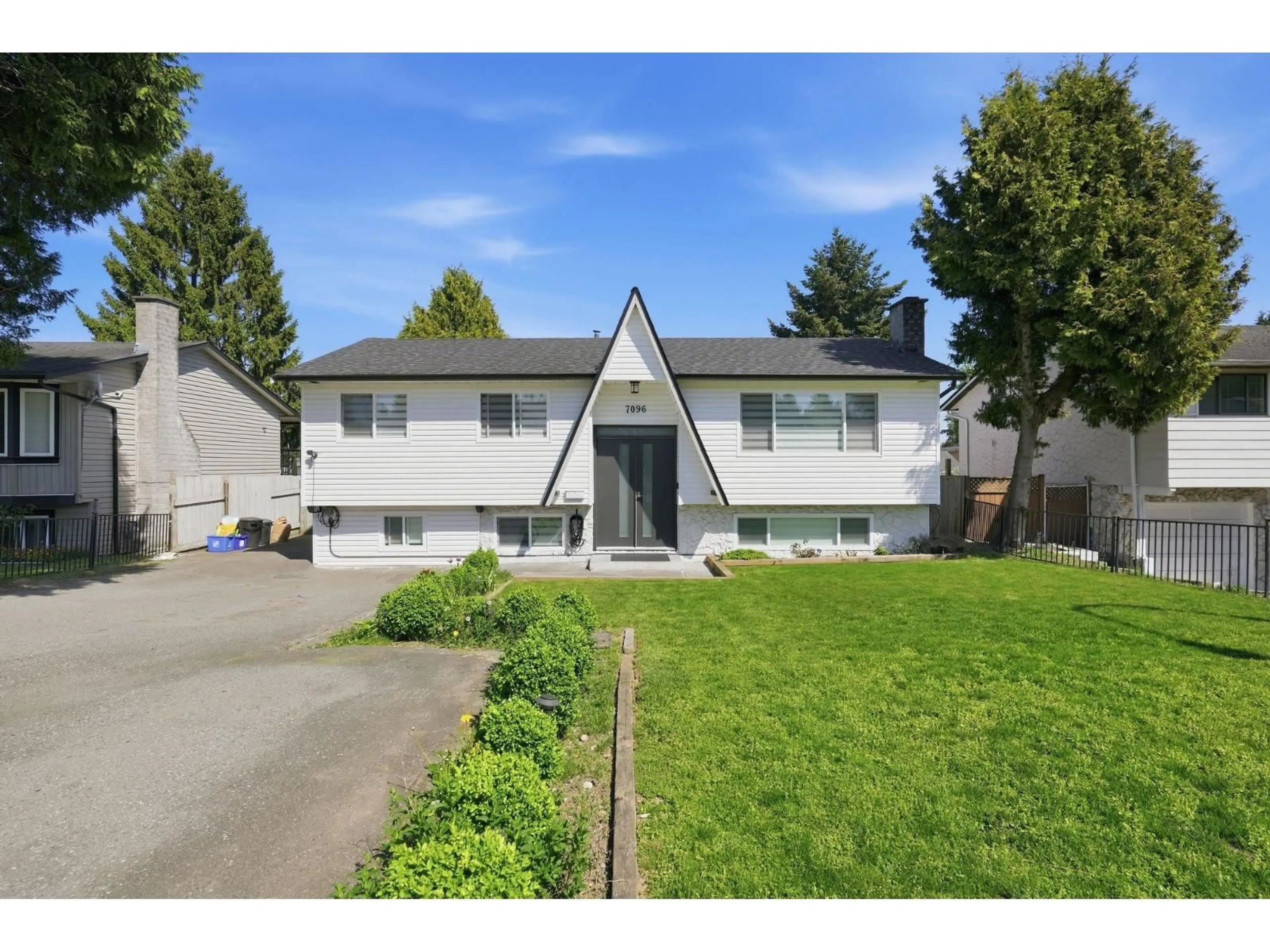 Home with vinyl exterior material, street for 7096 BREWSTER DRIVE EAST, Delta British Columbia V4E1V6