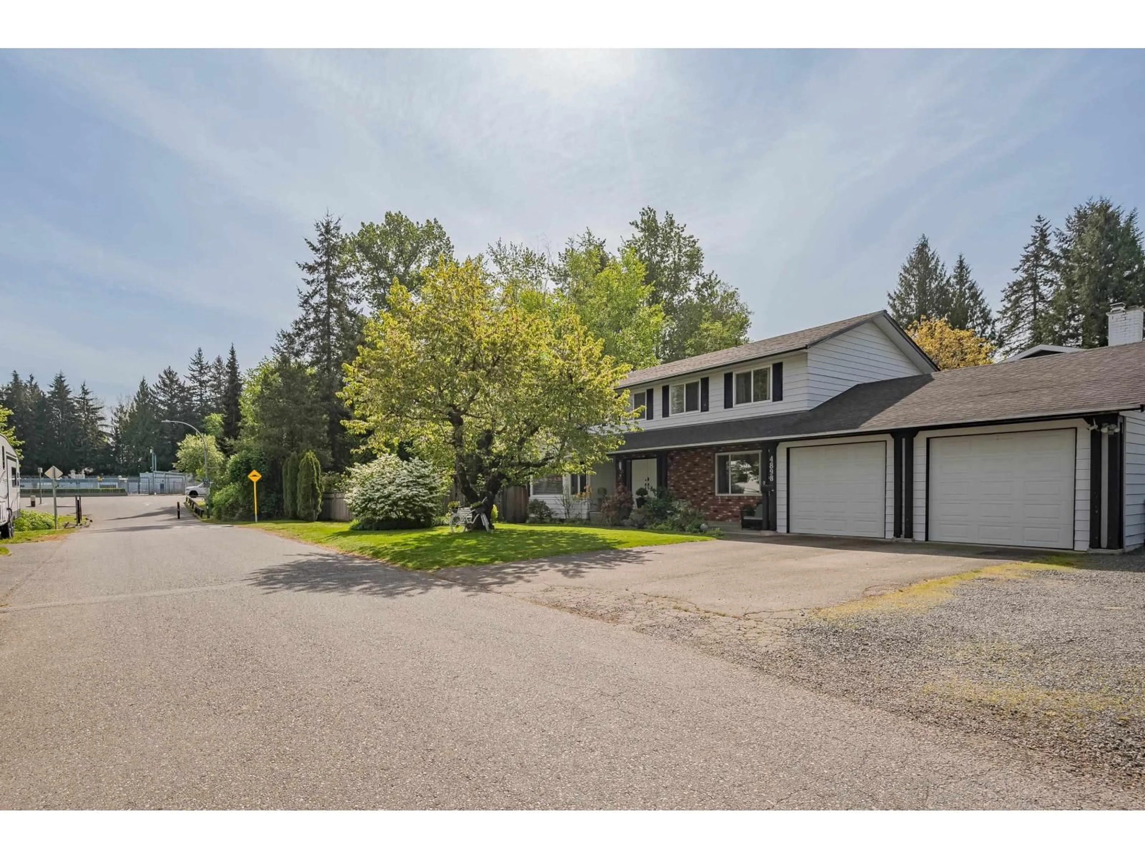A pic from outside/outdoor area/front of a property/back of a property/a pic from drone, street for 4898 205A STREET, Langley British Columbia V3A5R1