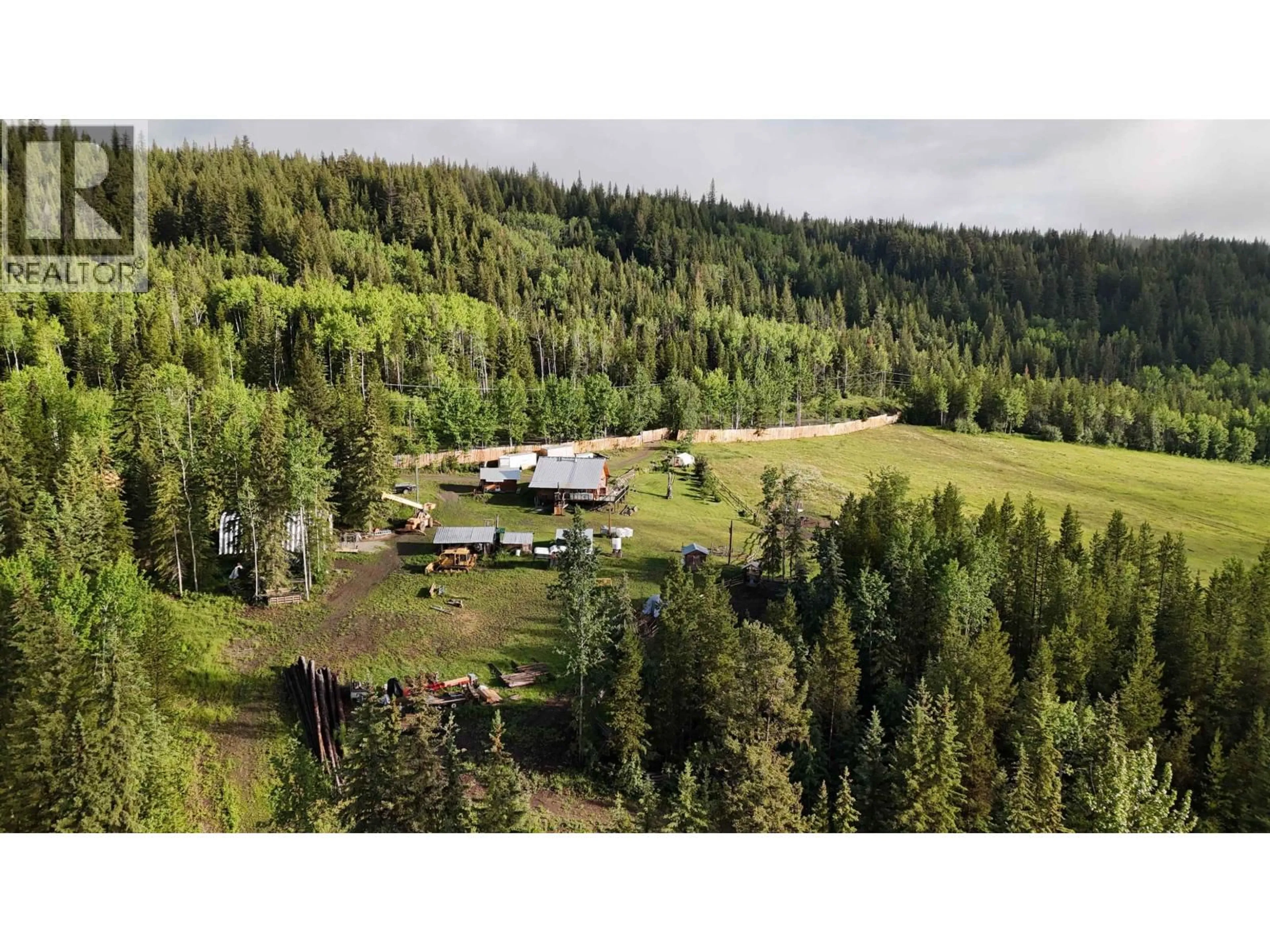 A pic from outside/outdoor area/front of a property/back of a property/a pic from drone, forest/trees view for 10260 NAZKO ROAD, Quesnel British Columbia V2J3H9