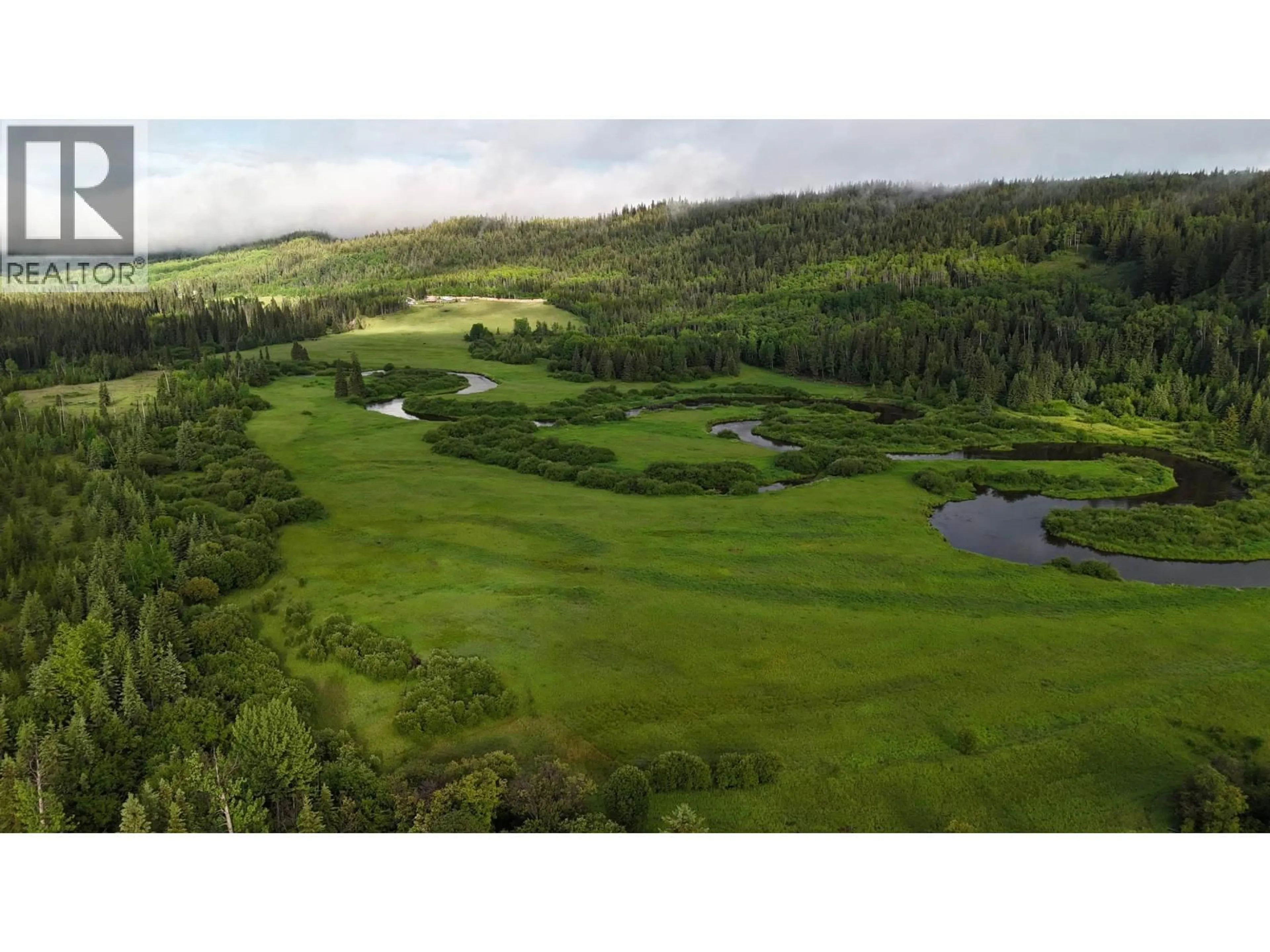 A pic from outside/outdoor area/front of a property/back of a property/a pic from drone, forest/trees view for 10260 NAZKO ROAD, Quesnel British Columbia V2J3H9