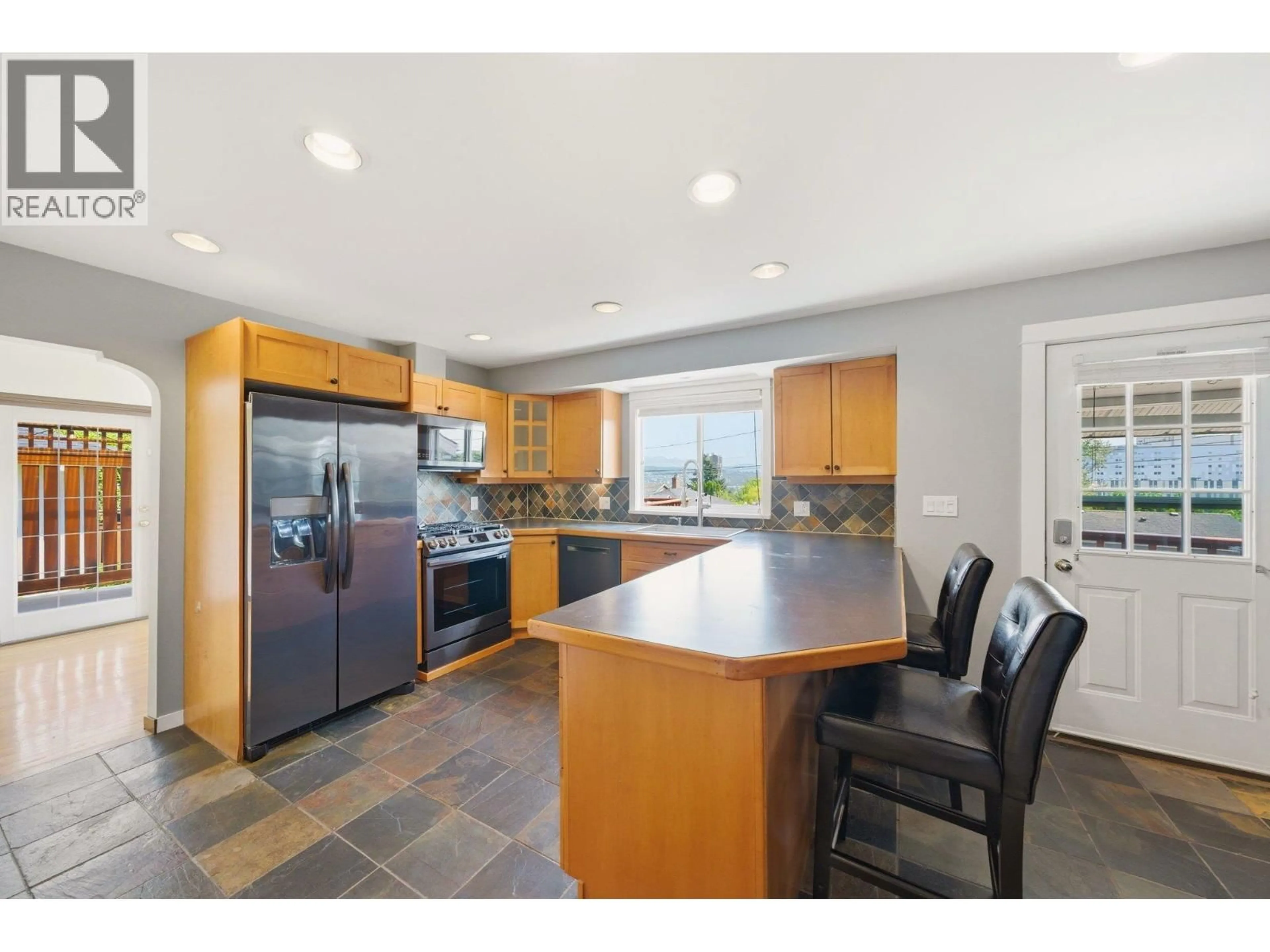 Open concept kitchen, ceramic/tile floor for 412 BLAIR AVENUE, New Westminster British Columbia V3L4A3