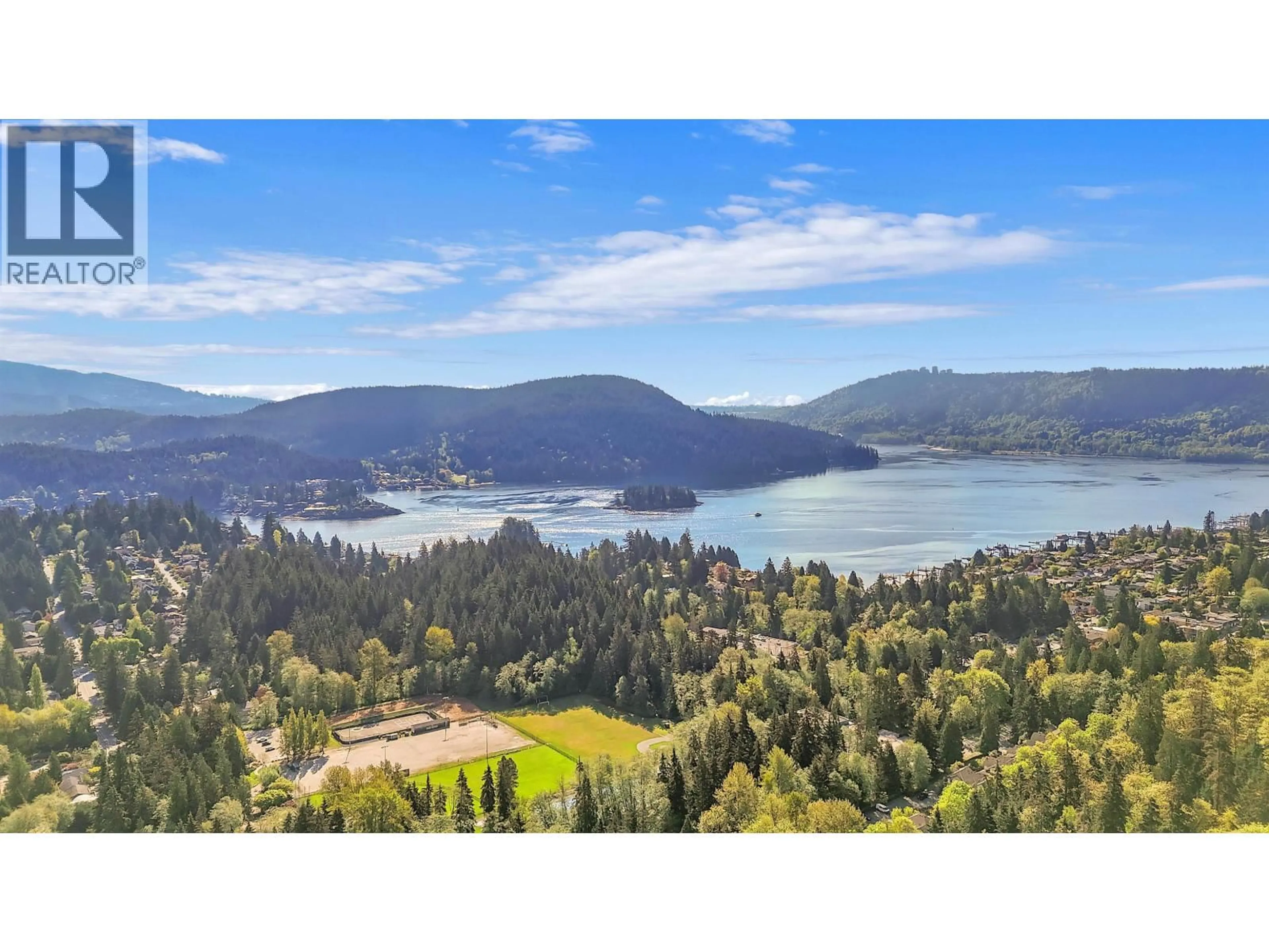 A pic from outside/outdoor area/front of a property/back of a property/a pic from drone, water/lake/river/ocean view for 207 - 1500 OSTLER COURT, North Vancouver British Columbia V7G2S2