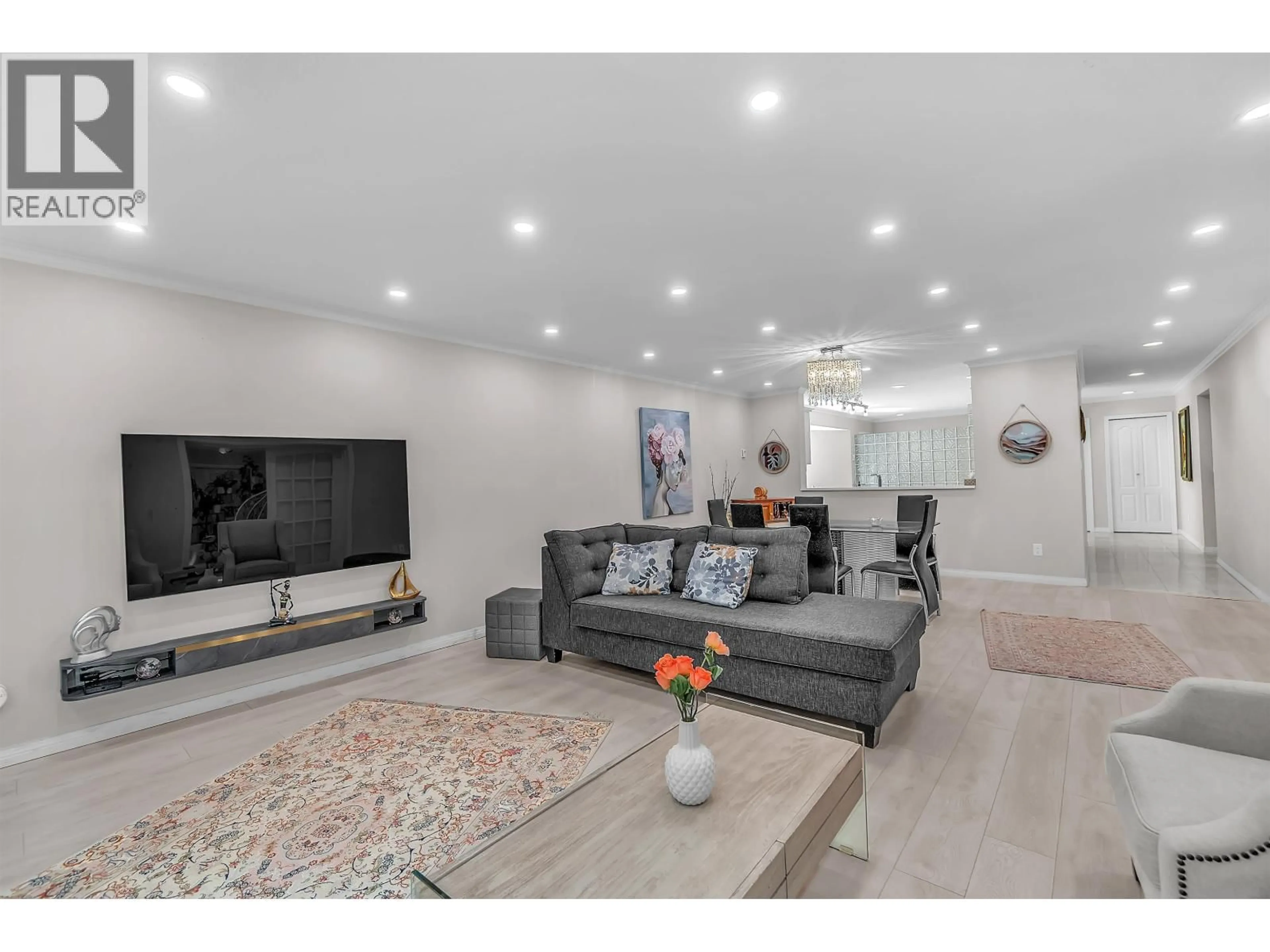 Living room with furniture, unknown for 207 - 1500 OSTLER COURT, North Vancouver British Columbia V7G2S2