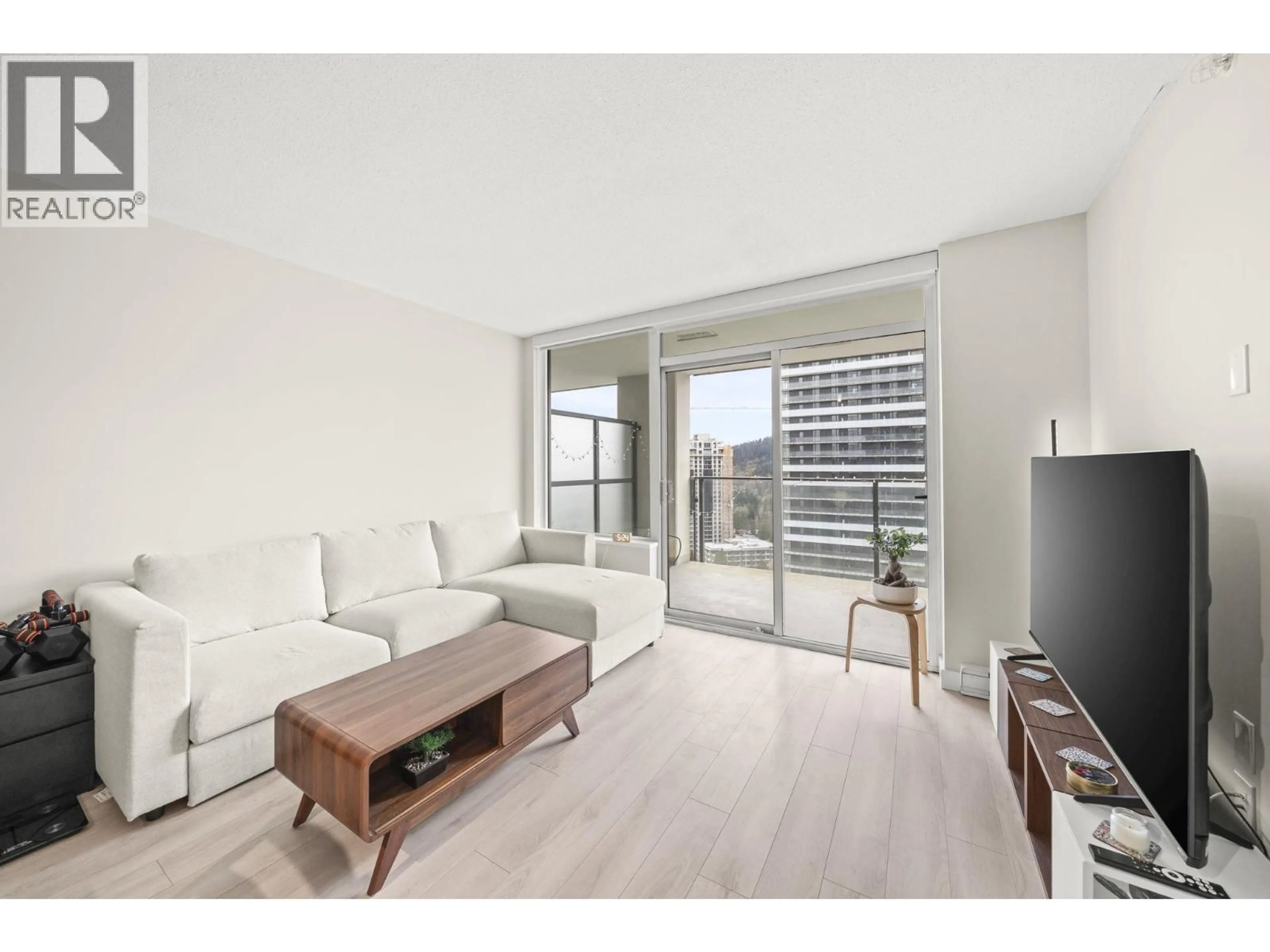 Living room with furniture, unknown for 2101 - 602 COMO LAKE AVENUE, Coquitlam British Columbia V3J0G3