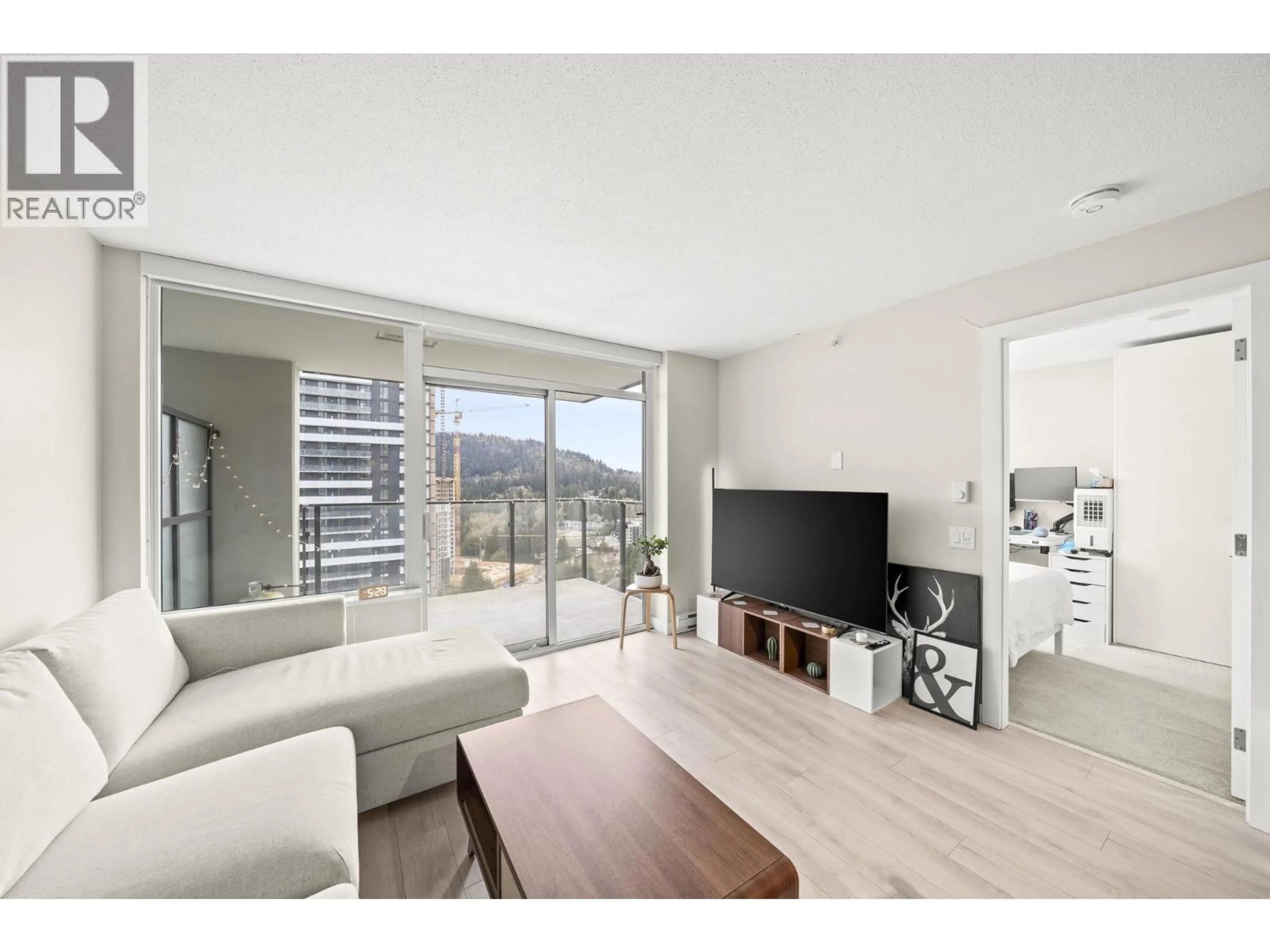 Living room with furniture, unknown for 2101 - 602 COMO LAKE AVENUE, Coquitlam British Columbia V3J0G3