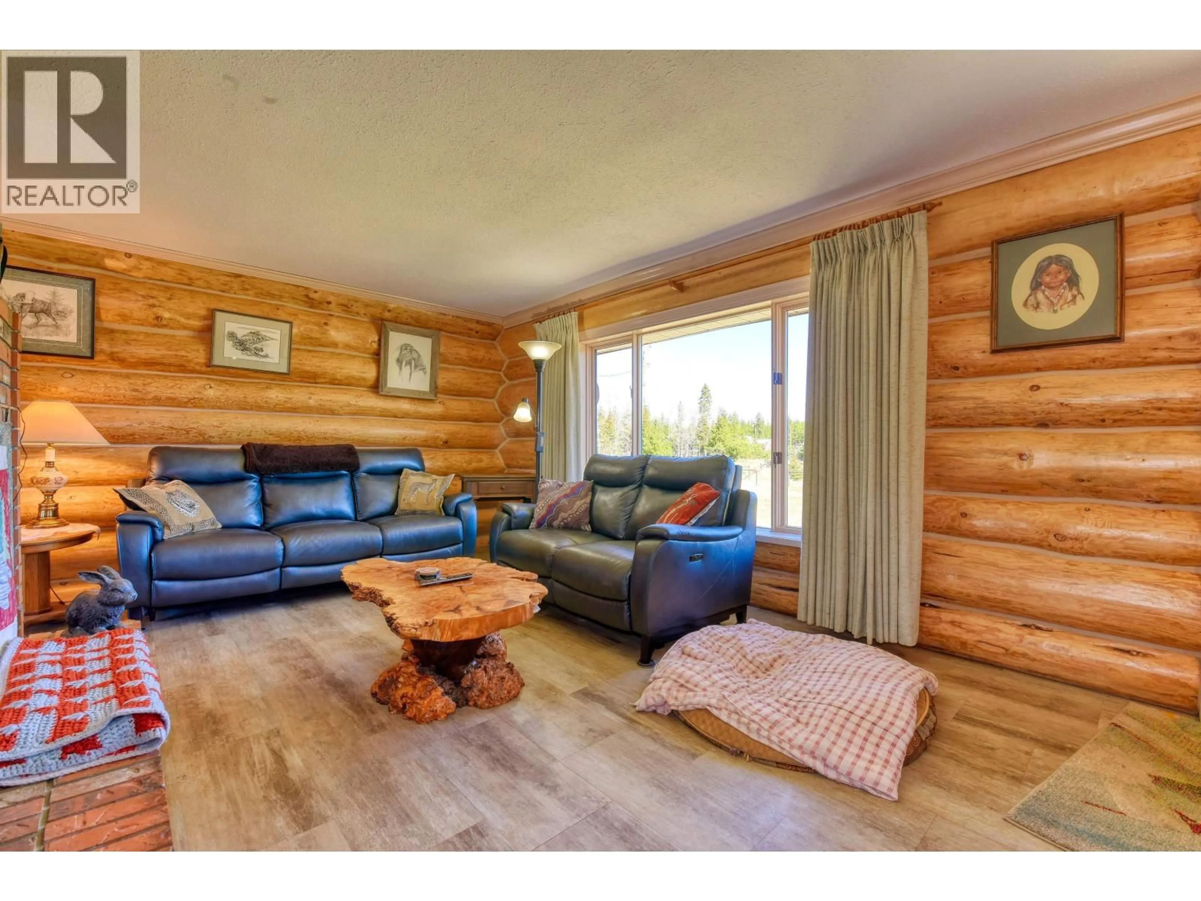 Living room with furniture, wood/laminate floor for 3574 SPOKIN LAKE ROAD, Williams Lake British Columbia V0K2G0
