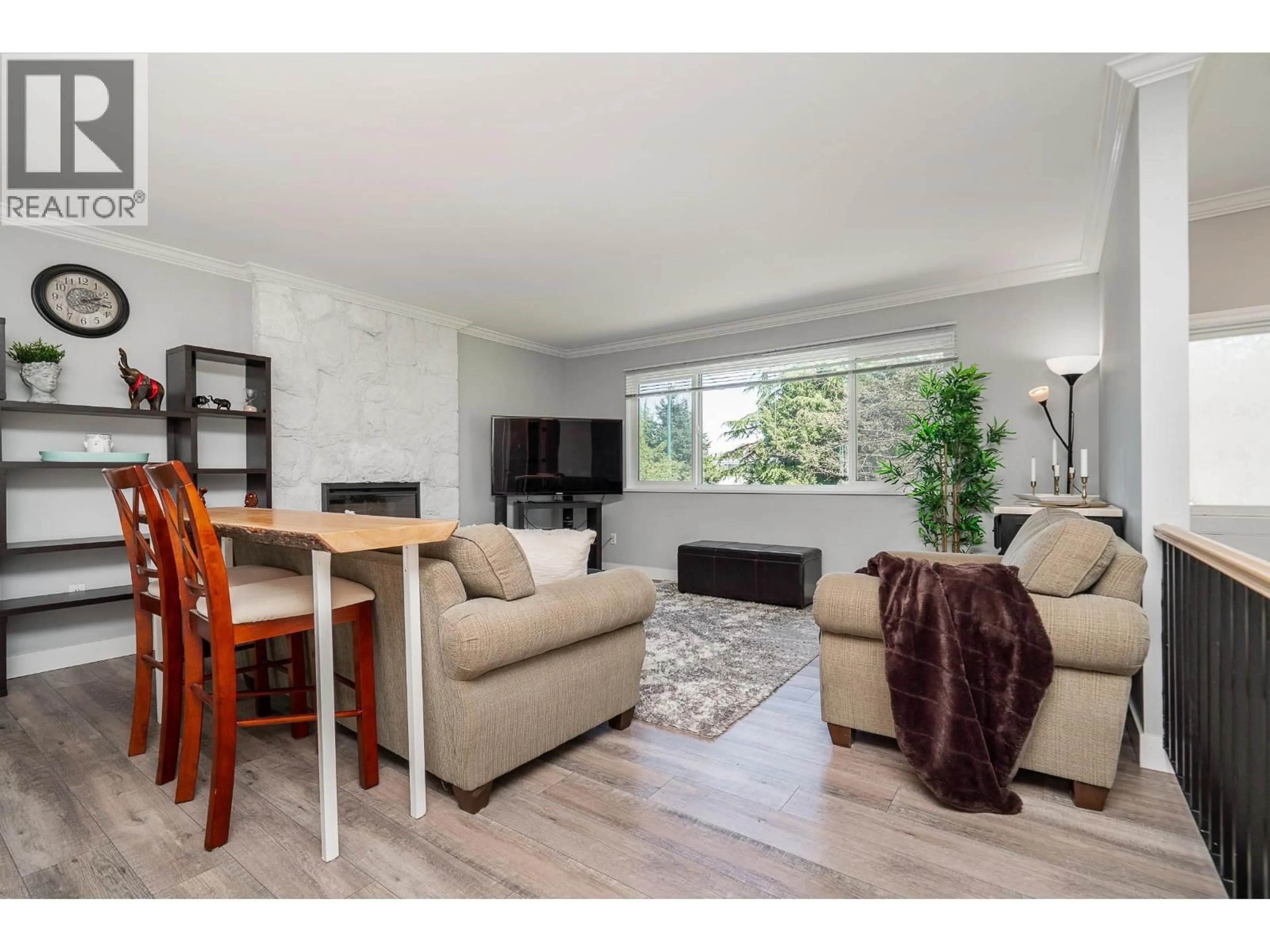 Living room with furniture, wood/laminate floor for 3158 MARINER WAY, Coquitlam British Columbia V3C3T3