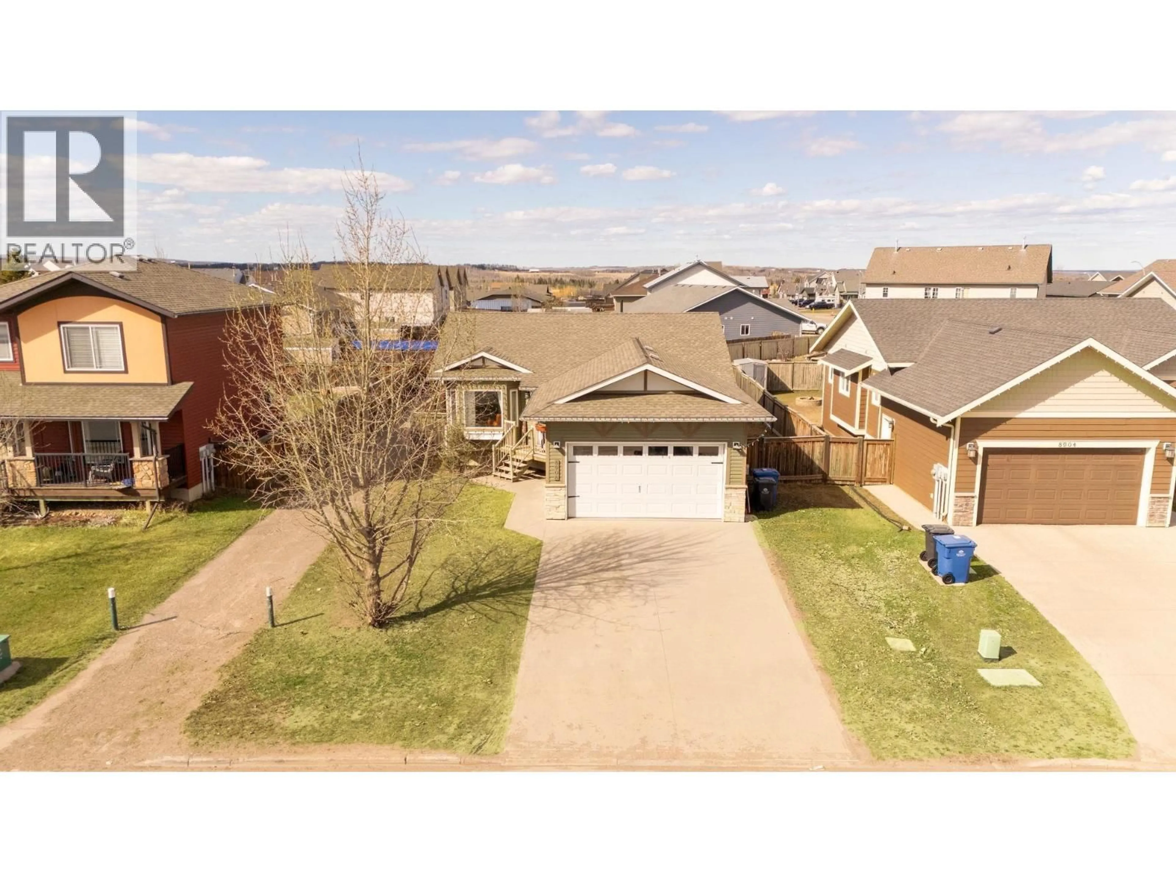 A pic from outside/outdoor area/front of a property/back of a property/a pic from drone, street for 8908 112 AVENUE, Fort St. John British Columbia V1J0J1