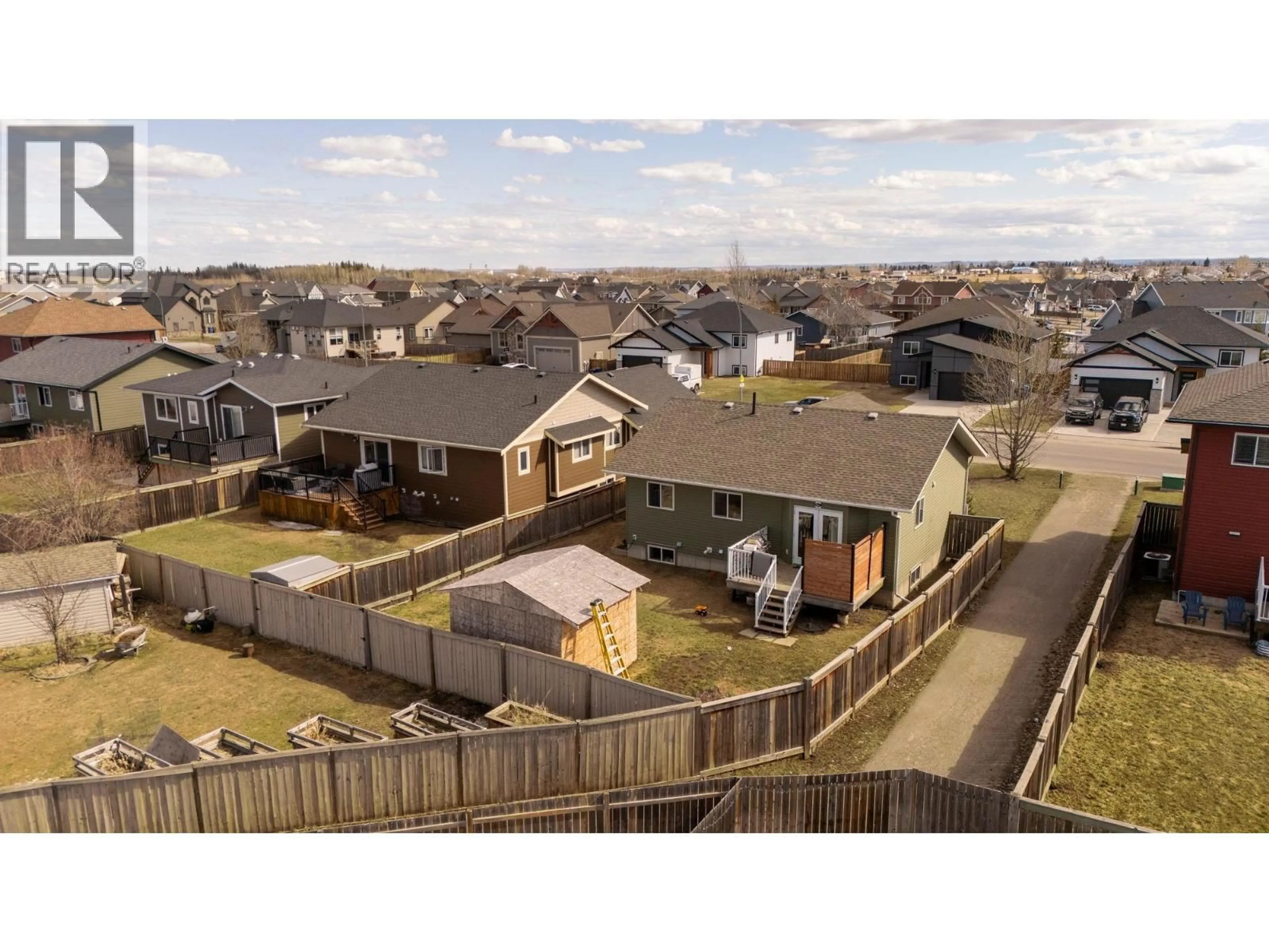 A pic from outside/outdoor area/front of a property/back of a property/a pic from drone, street for 8908 112 AVENUE, Fort St. John British Columbia V1J0J1